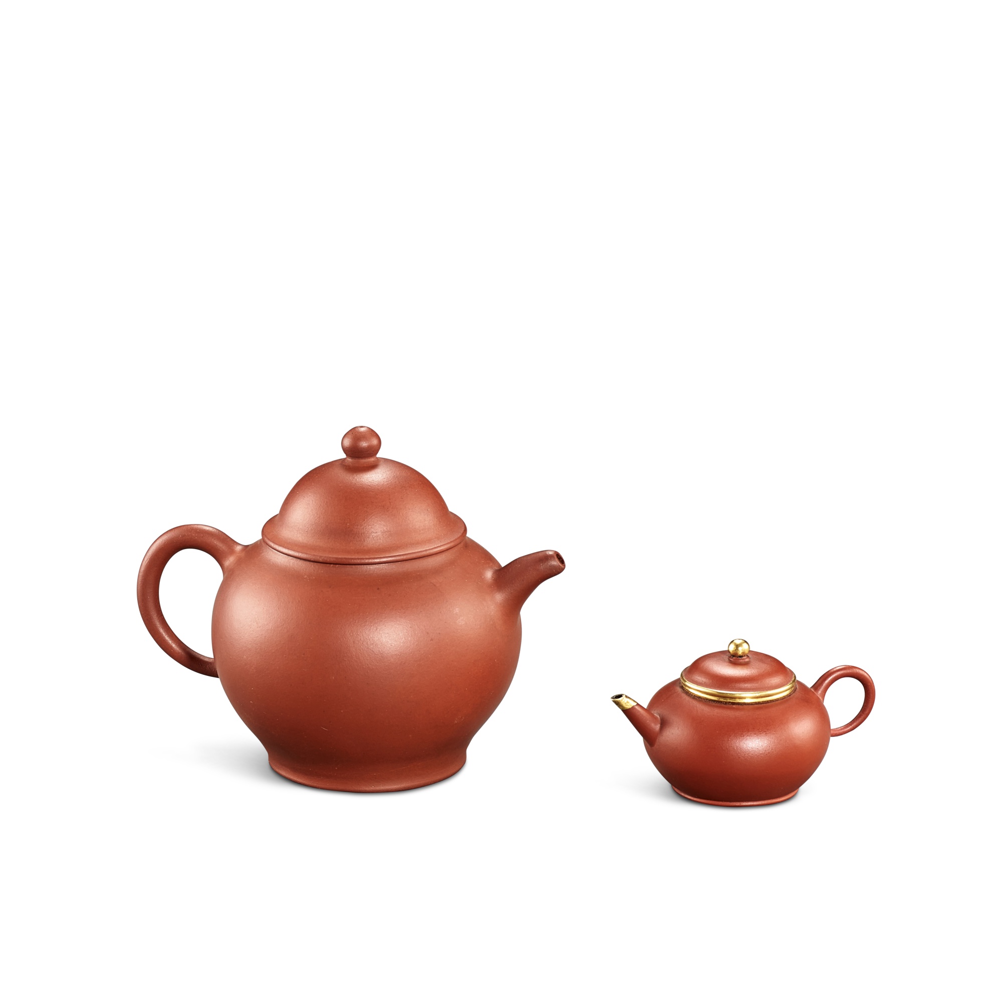 Two Yixing teapots