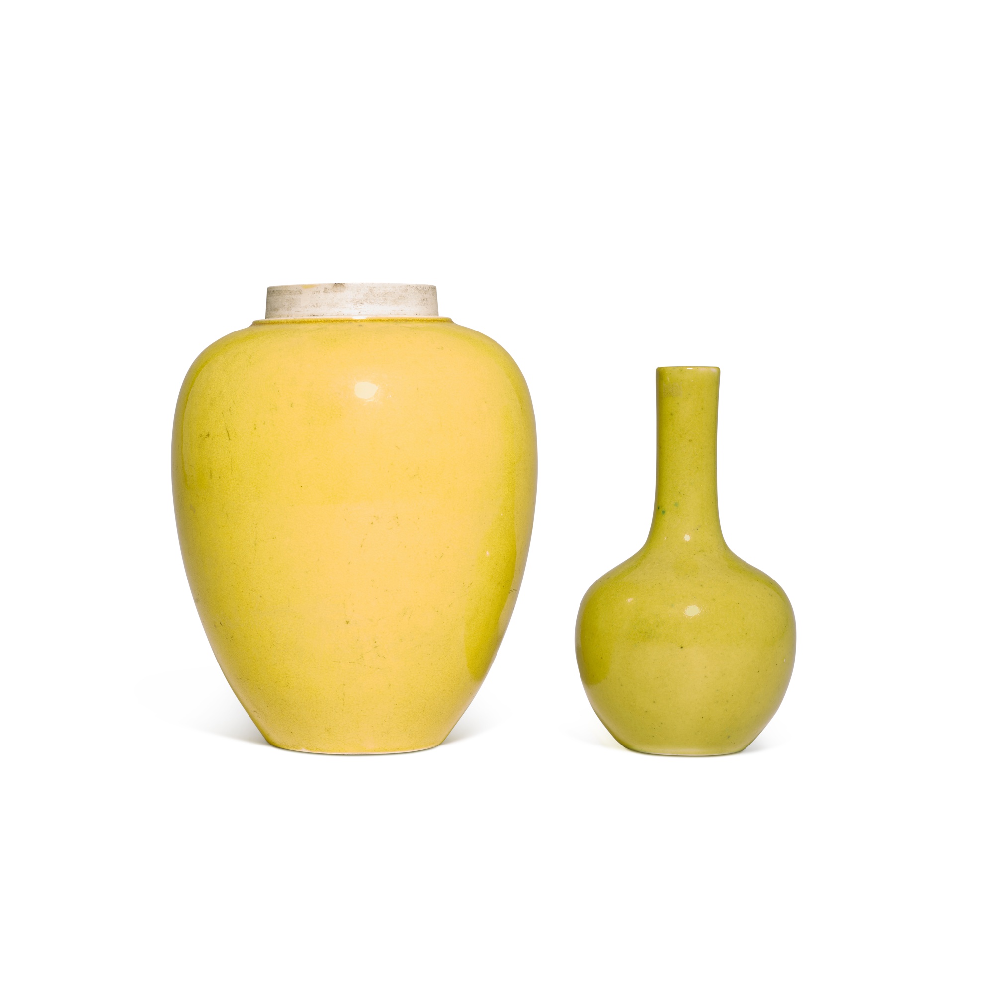 Two yellow-glazed jars / vases,