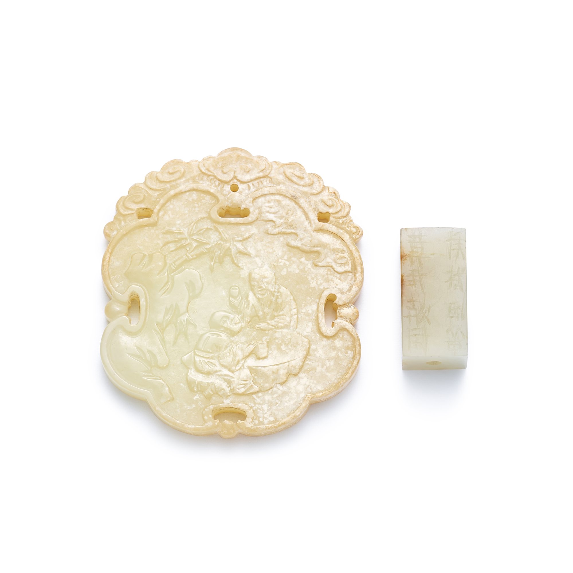 Two inscribed jade ornaments,