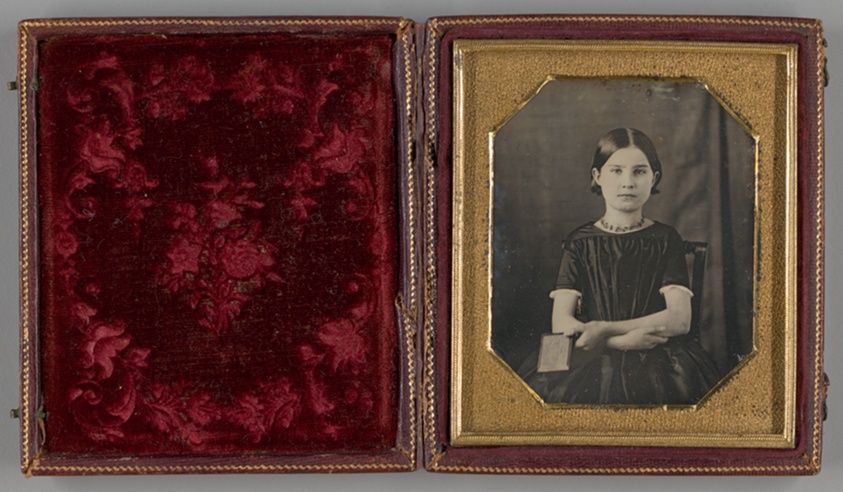 Artist unknown — Untitled (Young Girl Holding Photograph)