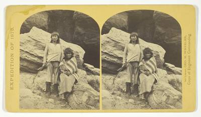 Navajo Brave and his Mother. The Navajo were formerly a warlike tribe until subdued by U.S. Troops, in 1859-60. Many of them now have fine flocks, and herds of horses, sheeps and goats, No. 29 from the series "Geographical Explorations and Surveys West of the 100th Meridian"