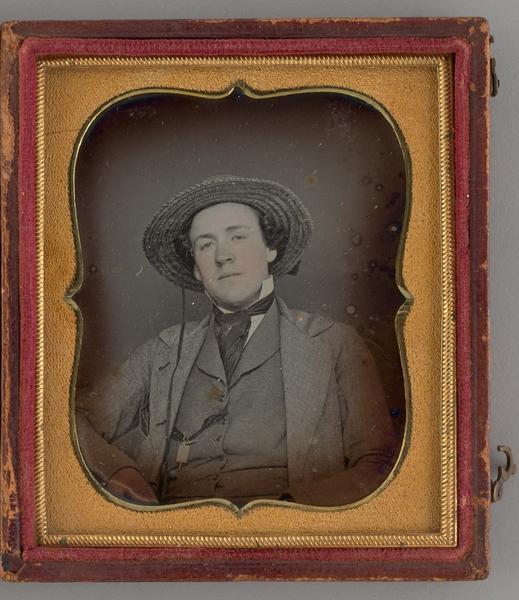 Untitled (Portrait of a Man with a Straw Hat)