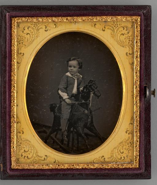 Untitled (Portrait of a Child on a Rocking Horse)