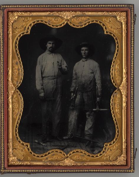 Untitled (Portrait of Standing Two Men Holding Tools)
