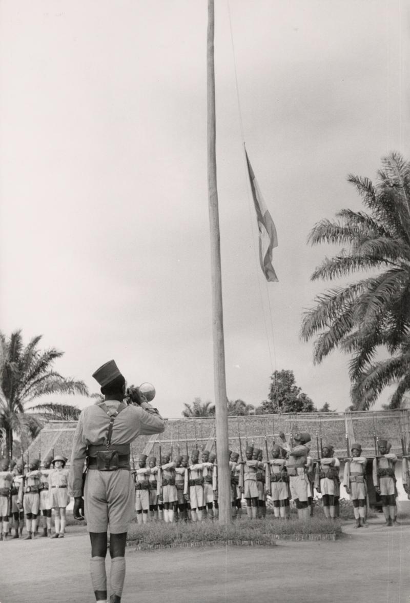 In Bouar near Duala, the flag of the Free France flies over the parade ground where recruits for the FFL are in training, Cameroon