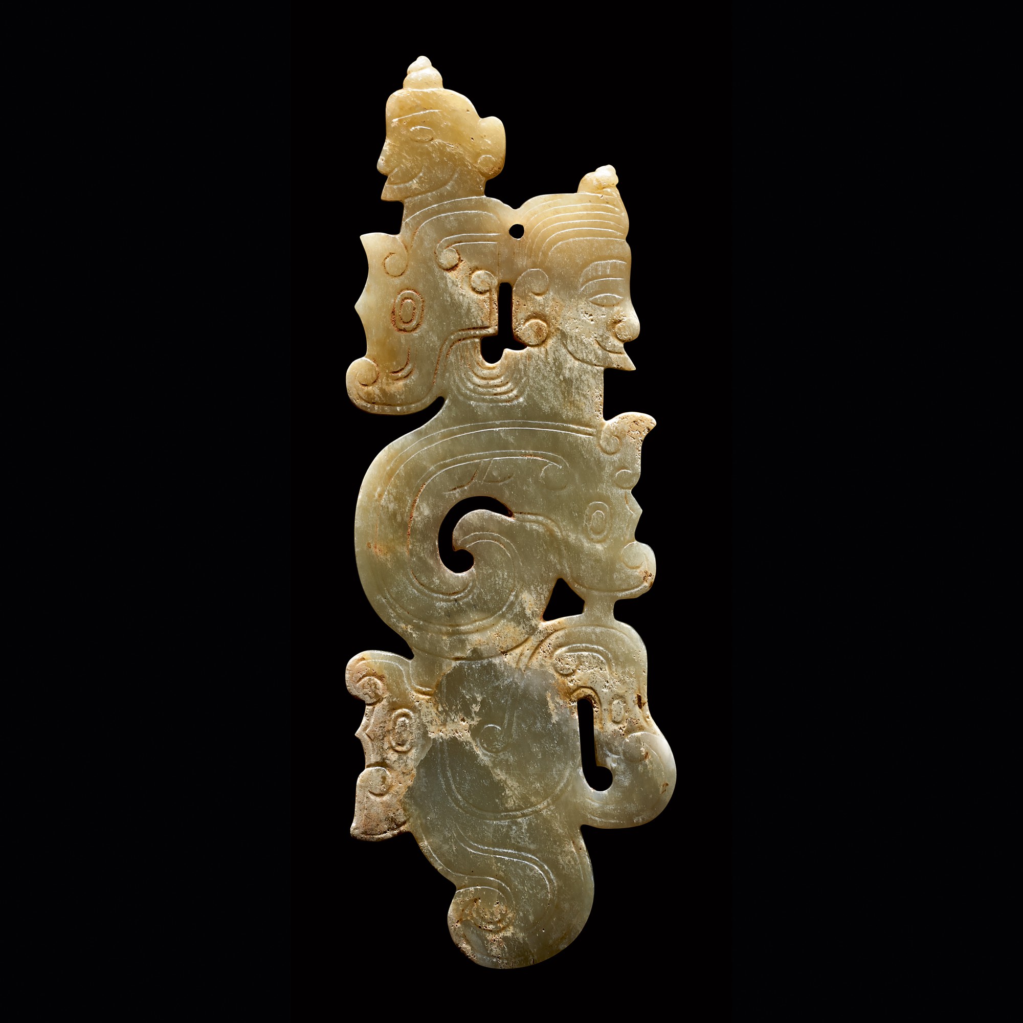 A rare jade 'human-dragon' pendant — 西周 人龍合璧玉珮