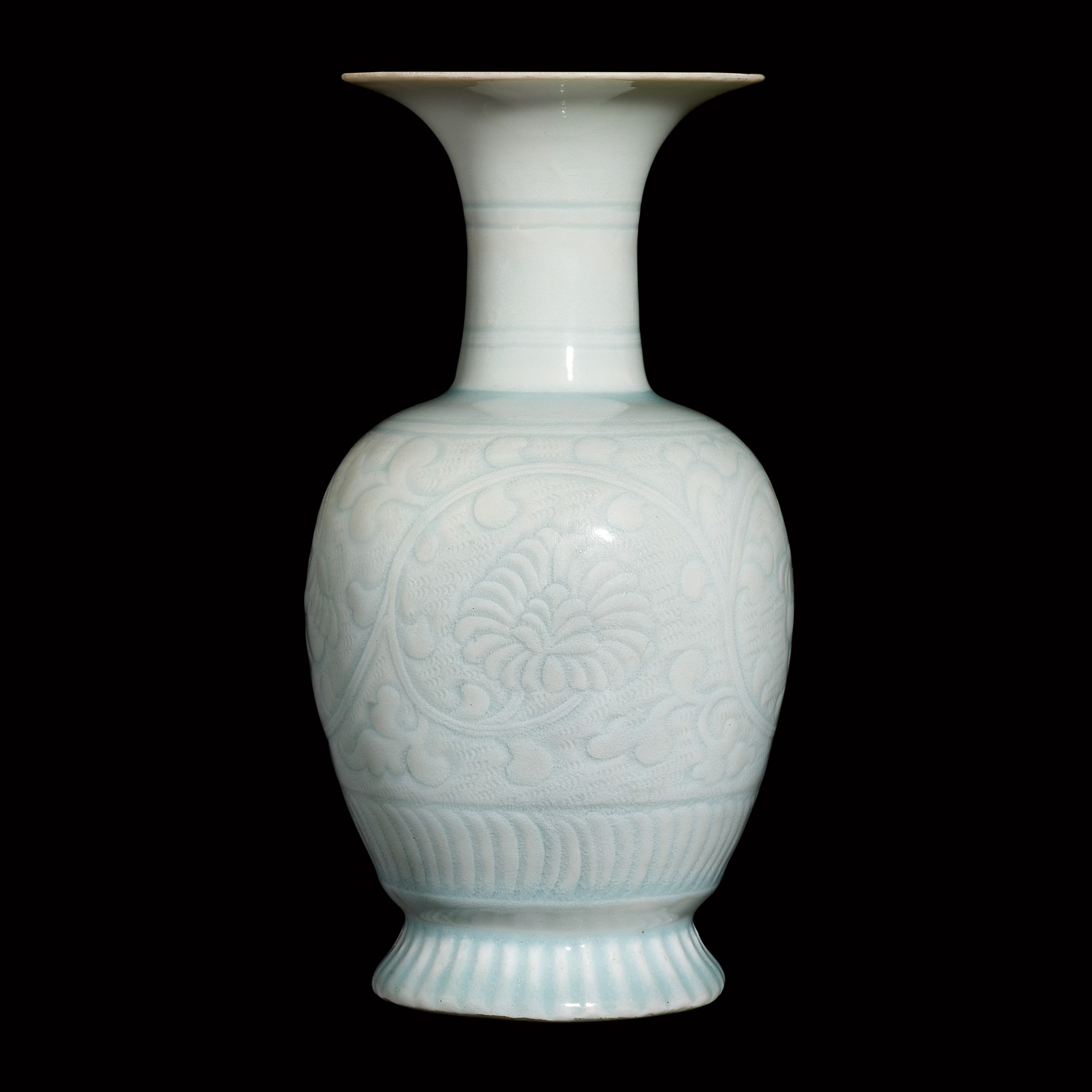 A carved qingbai 'chrysanthemum' vase — 宋 青白釉纏枝菊花紋撇口瓶