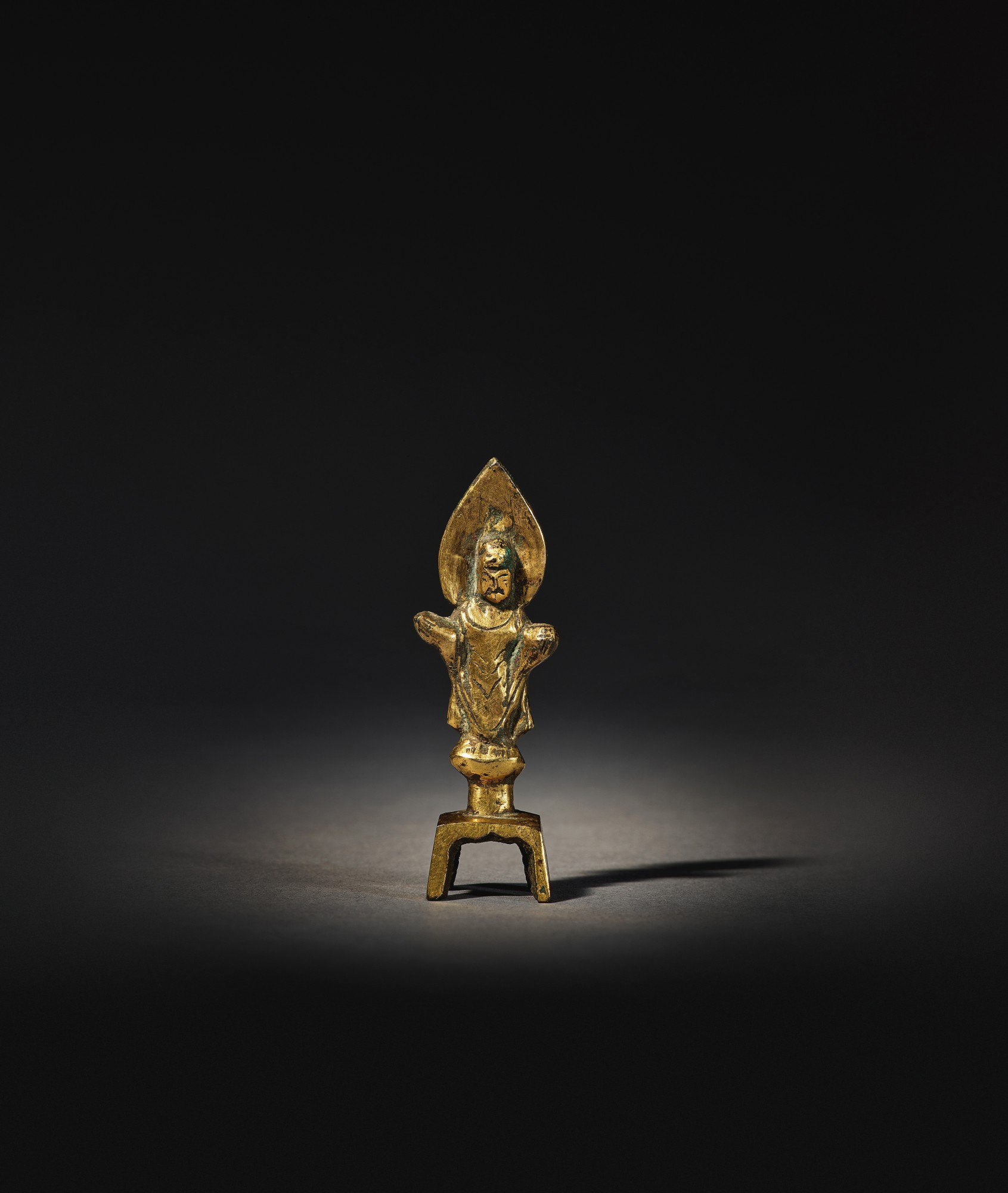 A miniature gilt-bronze figure of Buddha — 隋 鎏金銅佛立像