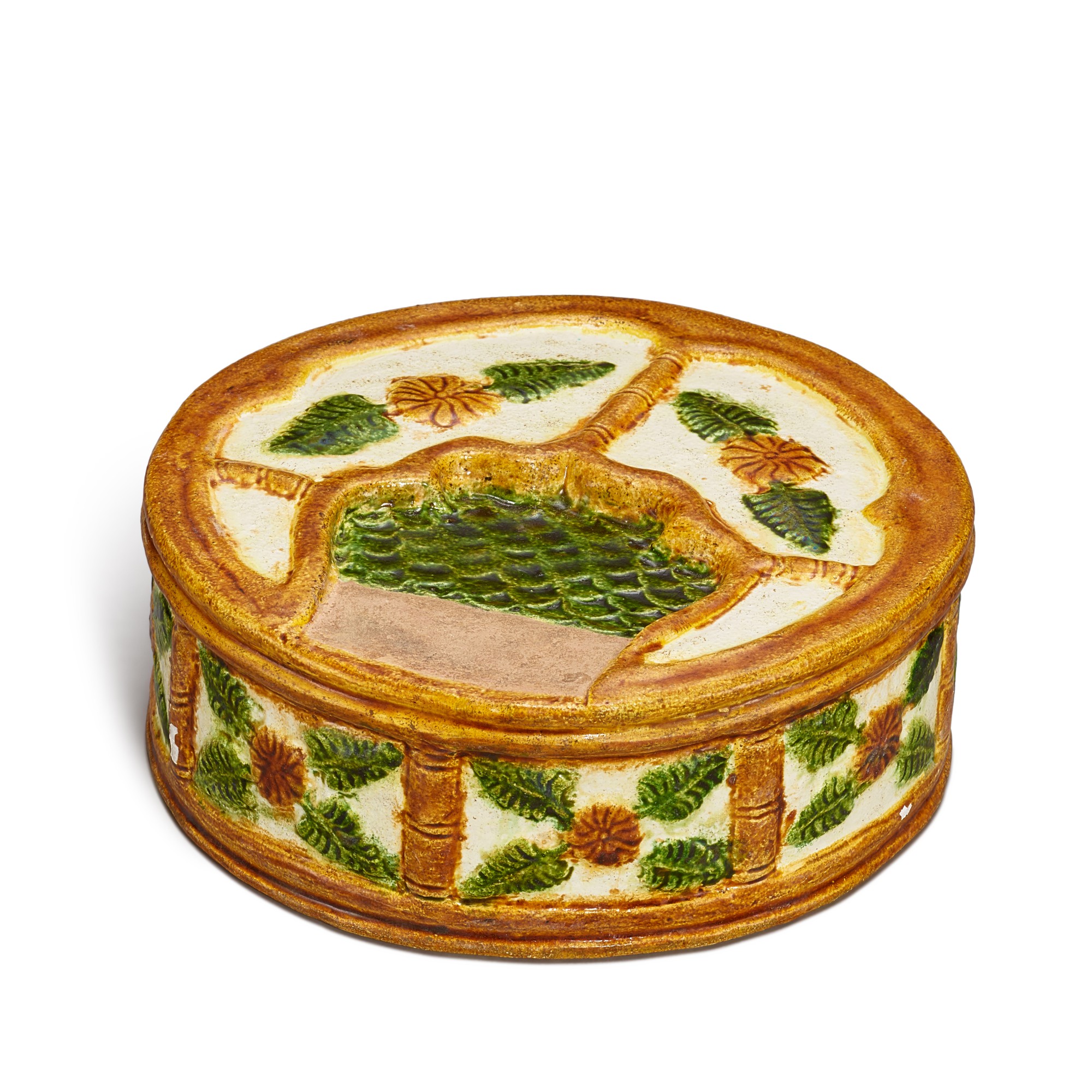 A sancai 'floral' inkstone, — A sancai 'floral' inkstone, Liao dynasty  遼 三彩印花卉紋硯