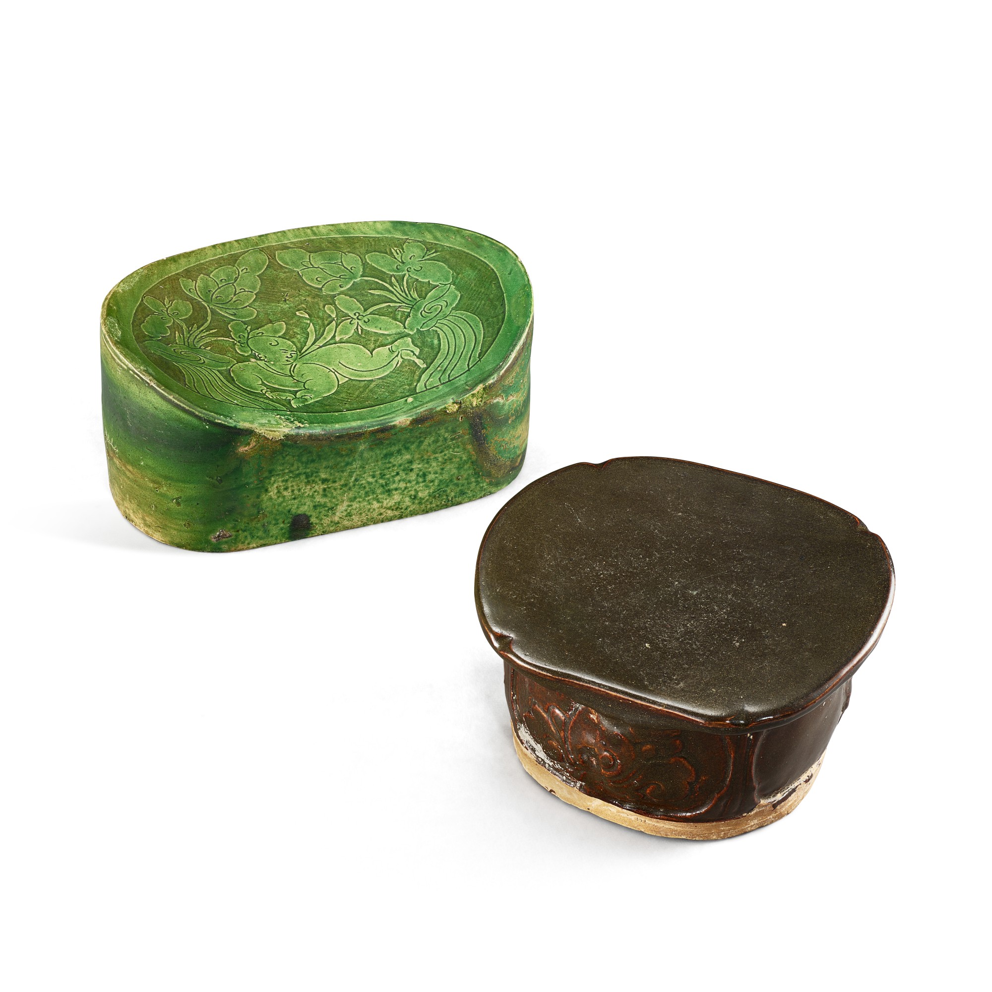 Unknown — A Cizhou carved green-glazed 'boy' pillow, Northern Song dynasty, and a Shanxi black-glazed 'opera' pillow, Jin dynasty 北宋 磁州窰綠釉刻連生貴子紋腰形枕 及 金 山西黑釉貼花戲劇人物紋枕