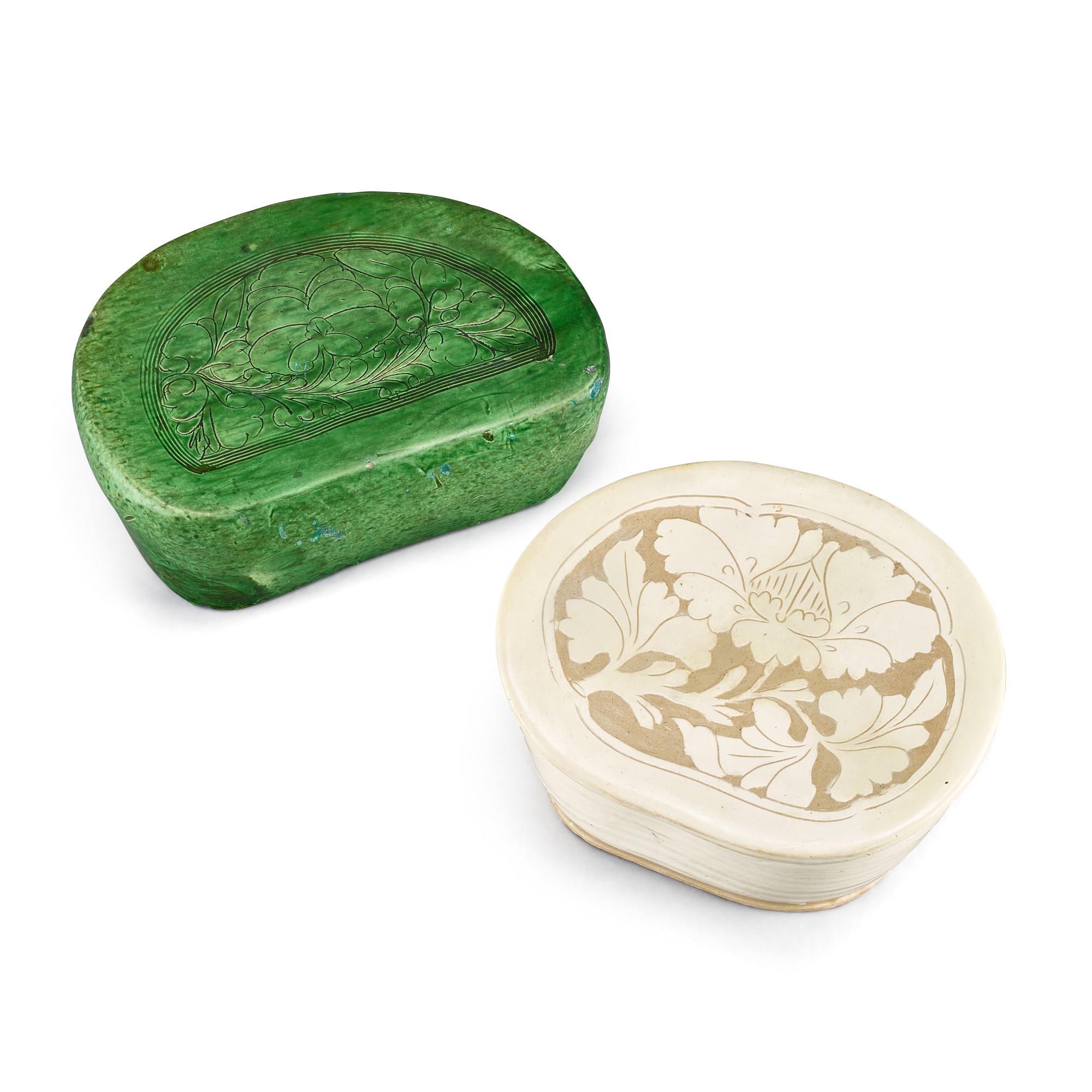 Unknown — A Shanxi carved 'peony' pillow and a Henan green-glazed 'peony' pillow, Northern Song - Jin dynasty 北宋至金 山西白地剔牡丹紋腰形枕 及 河南綠釉劃牡丹紋腰形枕