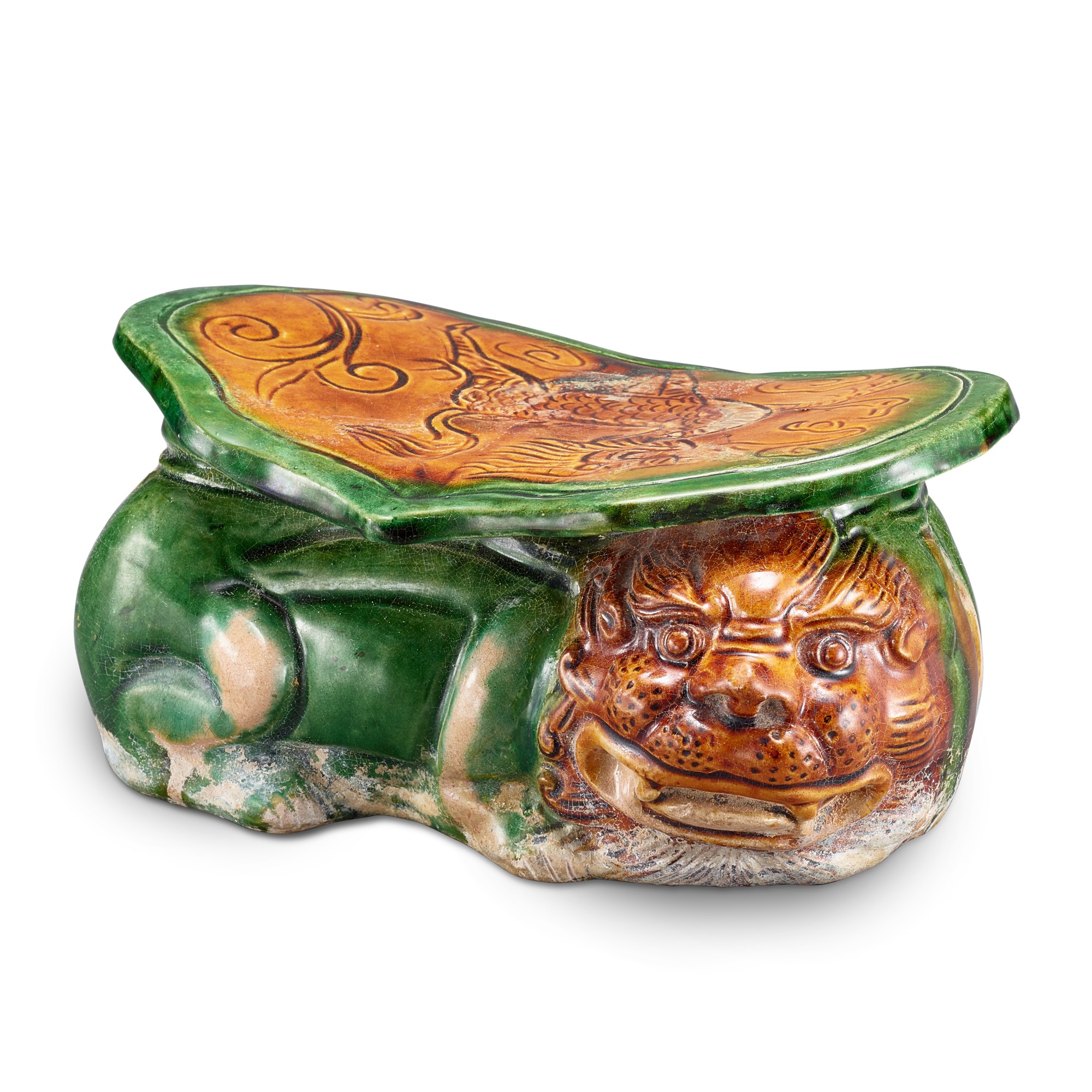 Unknown — A Shanxi sancai 'lion' pillow, Northern Song dynasty 北宋 山西三彩劃麒麟紋臥獅形枕