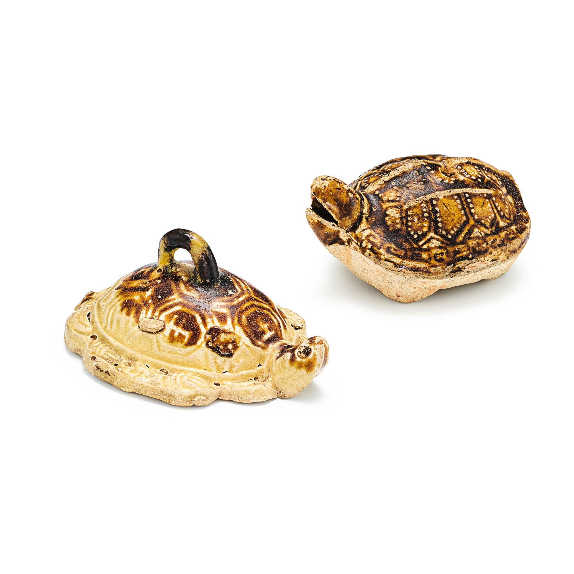 A Changsha brown-glazed 'turtle' water dropper and a paperweight, — A Changsha brown-glazed 'turtle' water dropper and a paperweight, Song dynasty 宋 長沙窰褐釉龜形水滴 及 鎮紙一組兩件