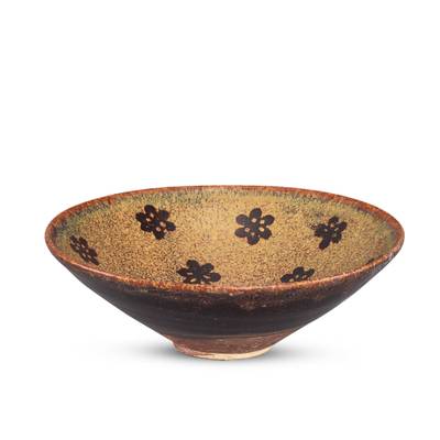A Jizhou 'papercut' 'prunus' bowl, Southern Song dynasty 南宋 吉州窰剪紙貼梅花紋盌