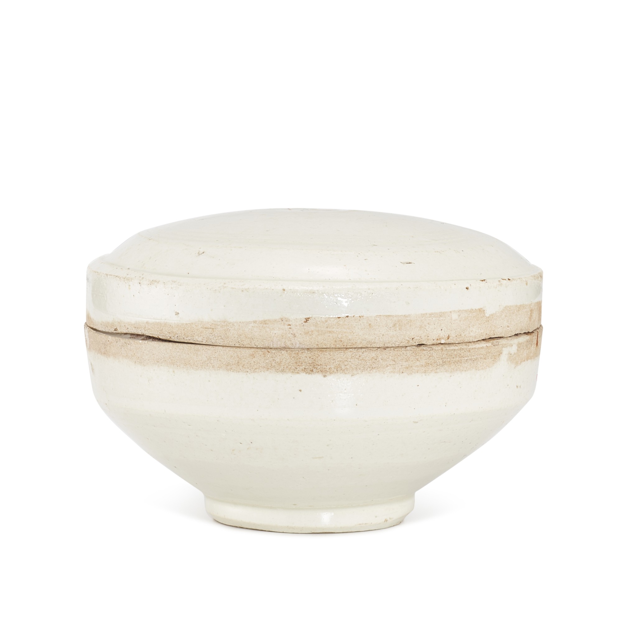 A Cizhou white-glazed circular box and cover, — A Cizhou white-glazed circular box and cover, Song dynasty 宋 磁州白釉圓蓋盒