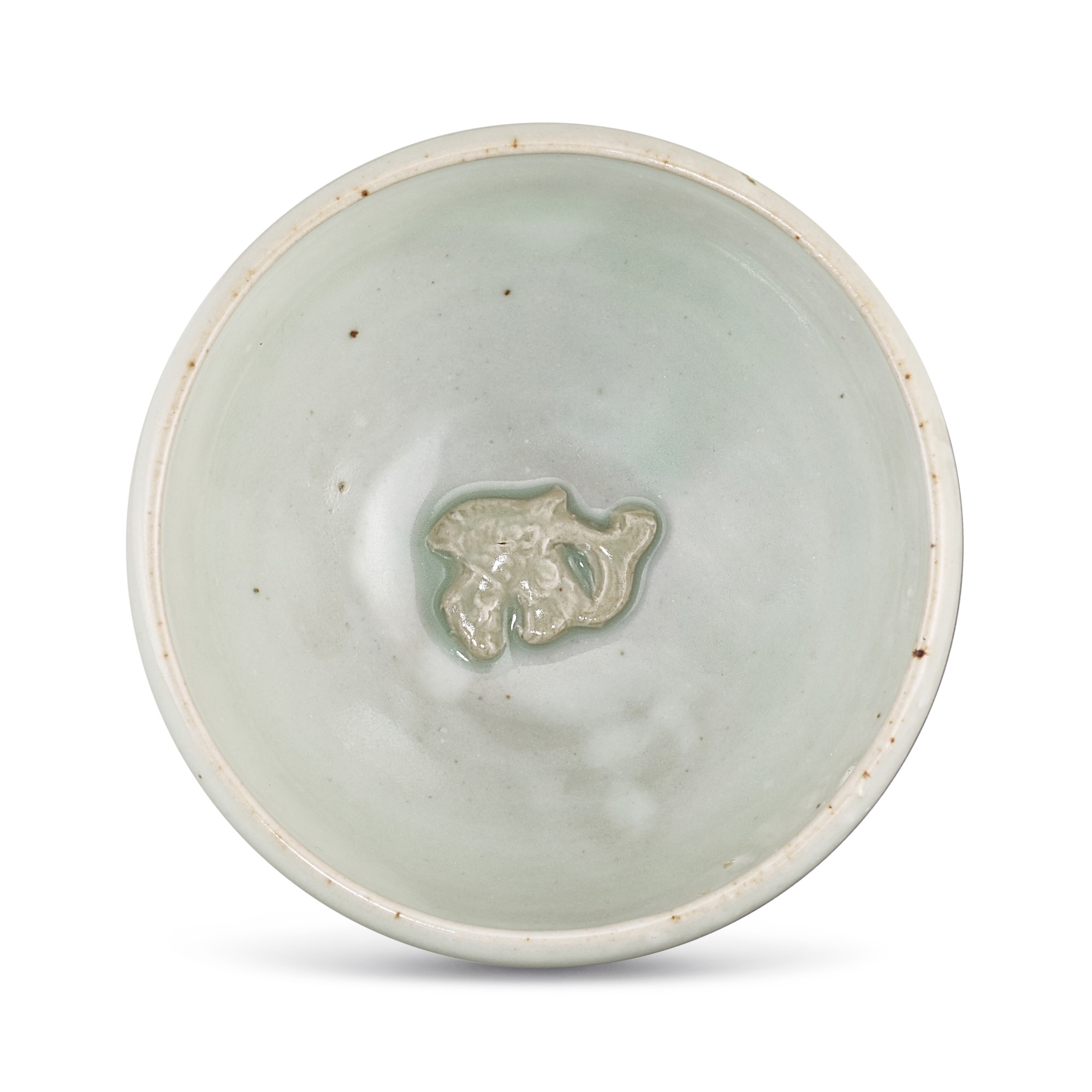 A moulded Yaozhou moon-white glazed 'fish' bowl, — A moulded Yaozhou moon-white glazed 'fish' bowl, Northern Song - Jin dynasty 北宋至金 耀州月白釉印魚紋斂口盌