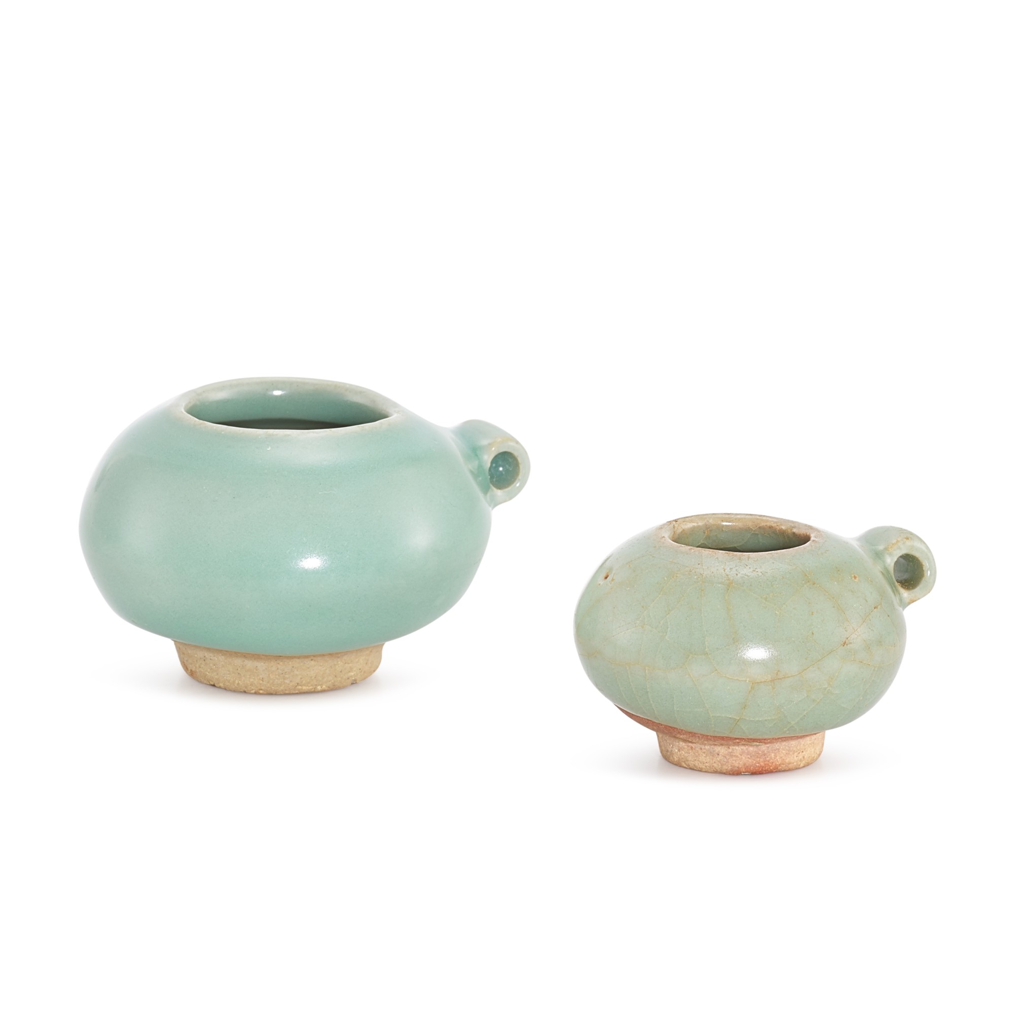 Two Longquan celadon bird feeders,