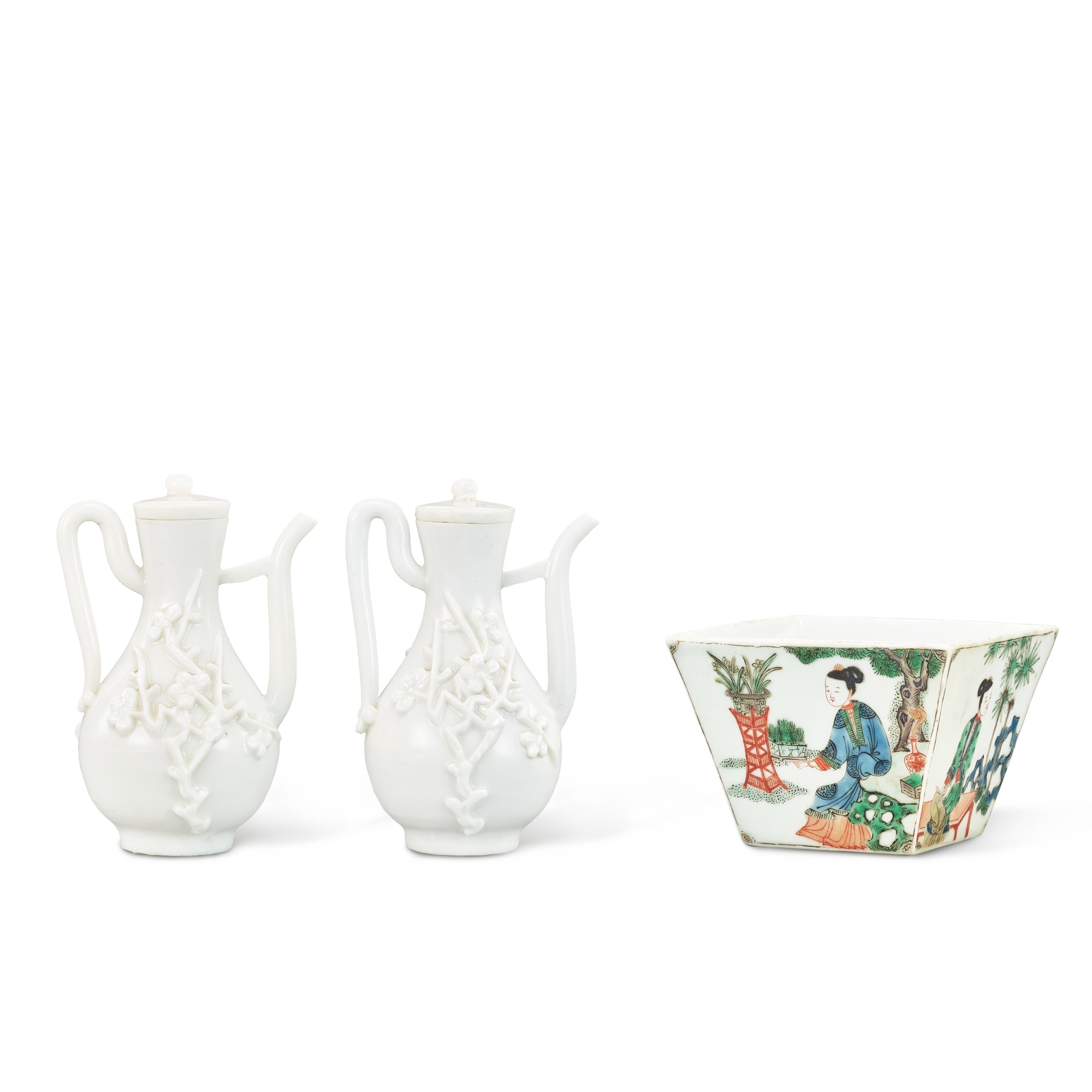 Two Dehua 'prunus' ewers,