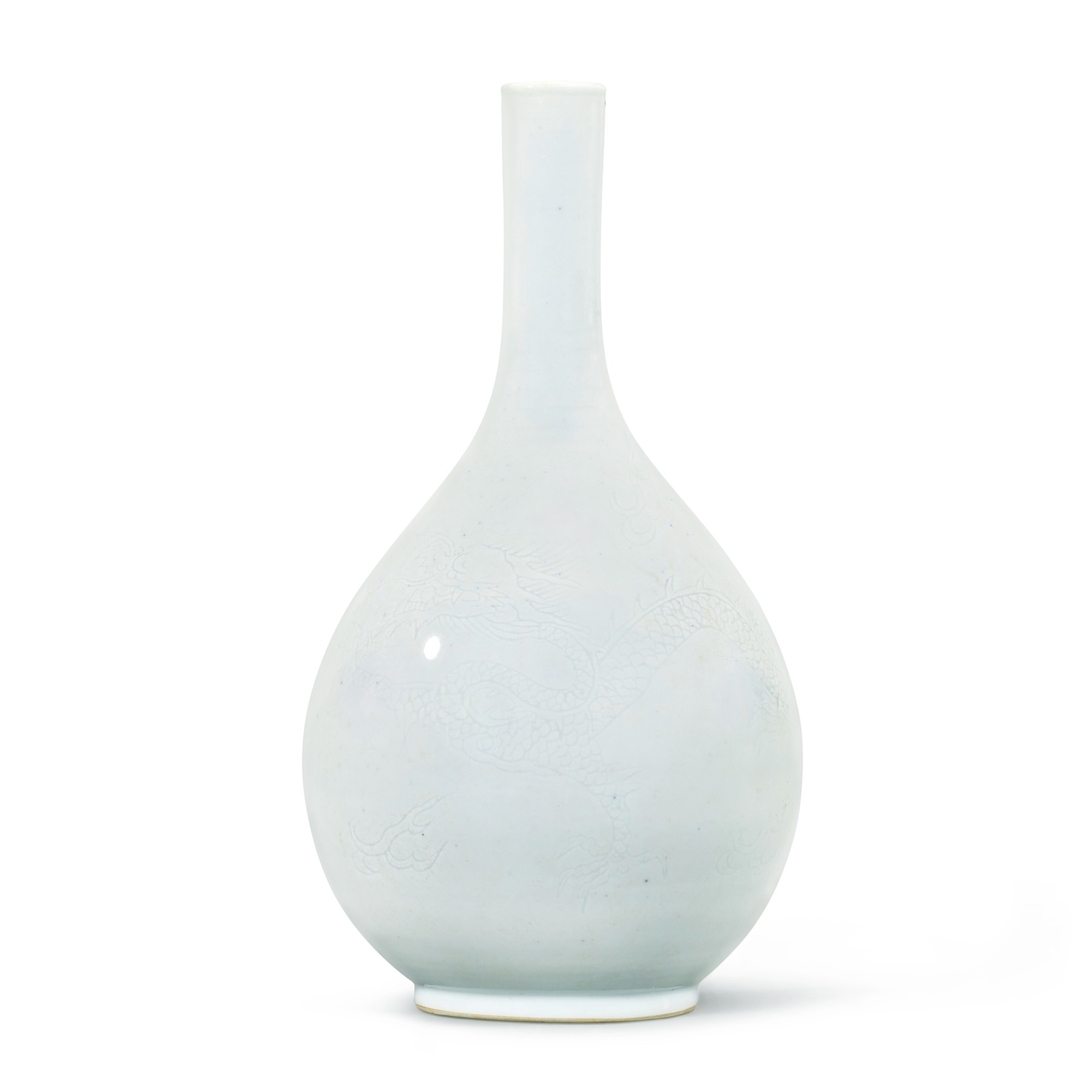 Unknown — A white-glazed incised 'dragon' bottle vase, Mark and period of Yongzheng  清雍正 白釉暗刻趕珠龍紋膽瓶