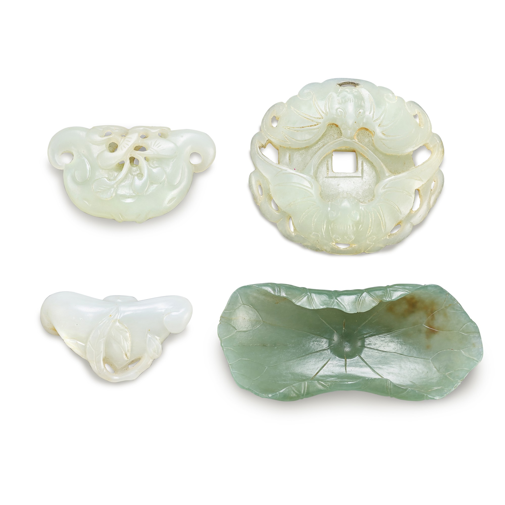 A group of four jade carvings, — A group of four jade carvings, Qing dynasty 清  白玉菱角珮兩件、白玉福壽雙全珮 及 碧玉荷葉式筆掭
