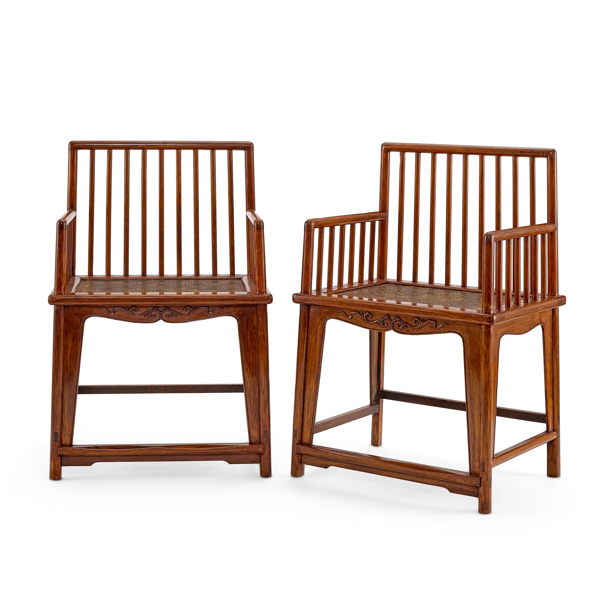 A pair of huanghuali comb-back armchairs — A pair of huanghuali comb-back armchairs 黃花梨梳背椅一對