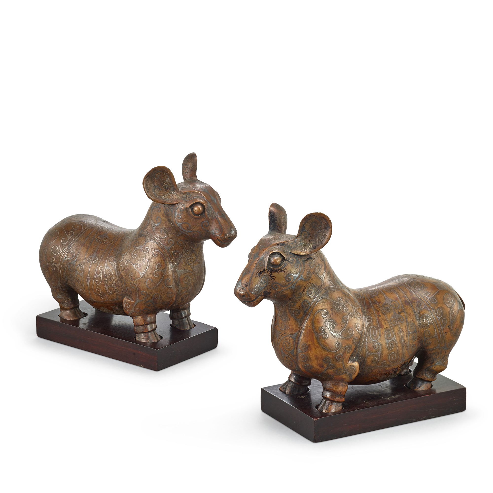Unknown — A pair of archaistic silver-inlaid bronze tapirs, Ming dynasty, 16th - 17th century 明十六至十七世紀 銅錯銀貘一對