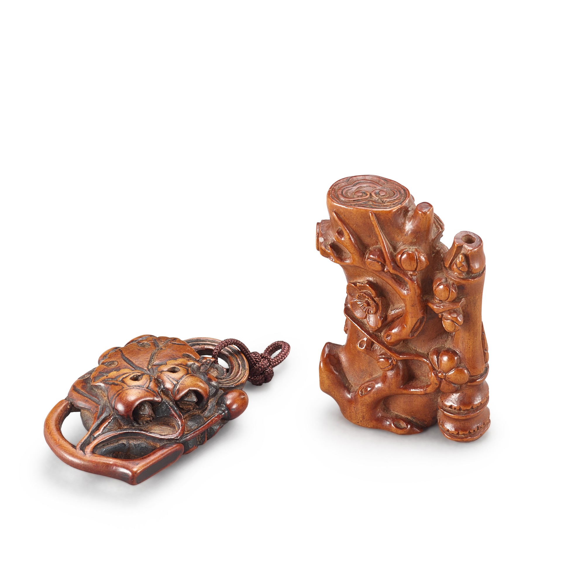 A boxwood carving of 'prunus and bamboo' and a boxwood 'furled leaf' pendant, — A boxwood carving of 'prunus and bamboo' and a boxwood 'furled leaf' pendant, Qing dynasty 清 黃楊木雕梅竹雙清 及 荷葉珮一組兩件