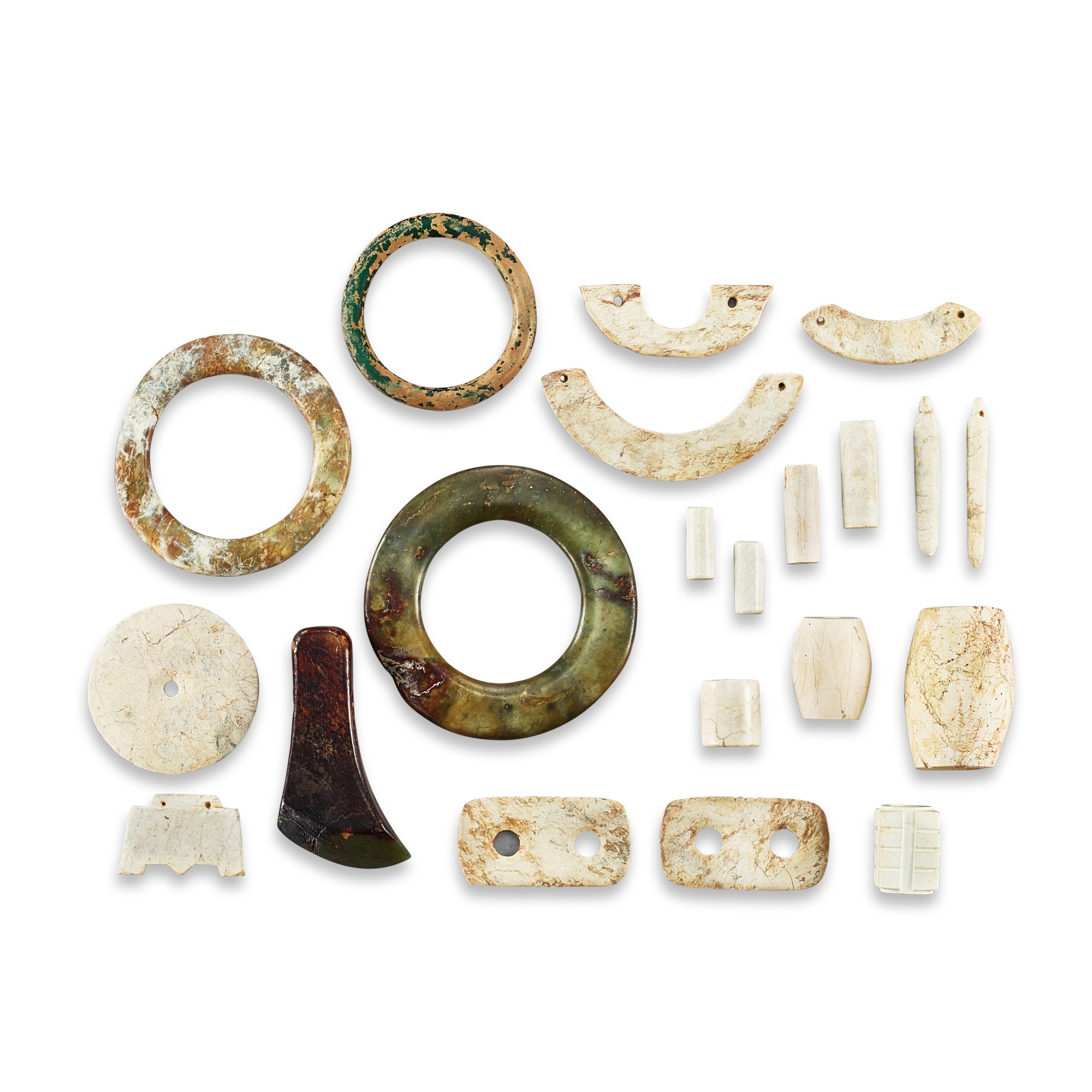 A group of 21 archaic and archaistic jade and glass ornaments — A group of 21 archaic and archaistic jade and glass ornaments 各式玉雕或玻璃珮飾一組二十一件
