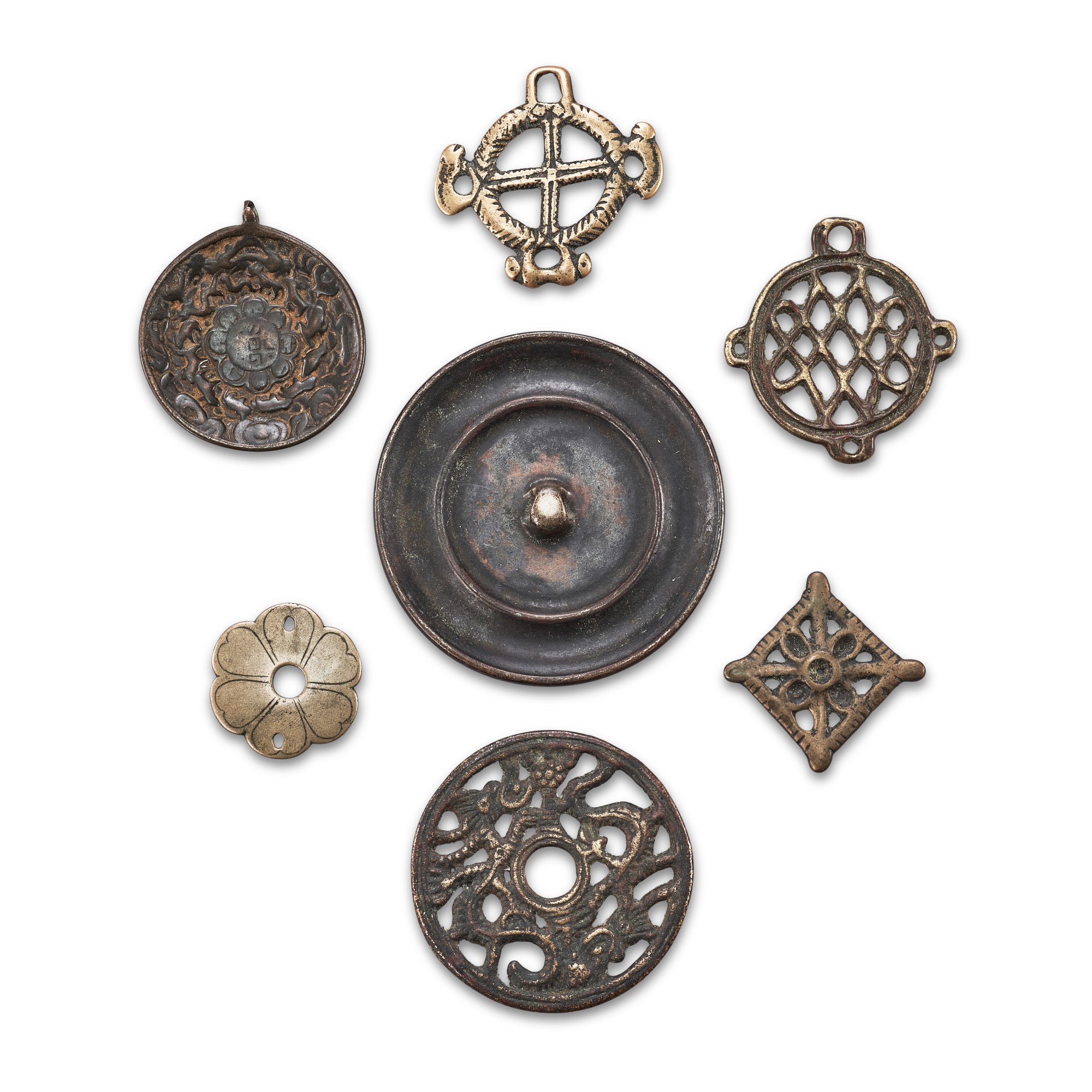 A group of 7 copper-alloy thogchags, — A group of 7 copper-alloy thogchags, Tibet, 12th - 15th century 十二至十五世紀 西藏 各式天鐵一組七件