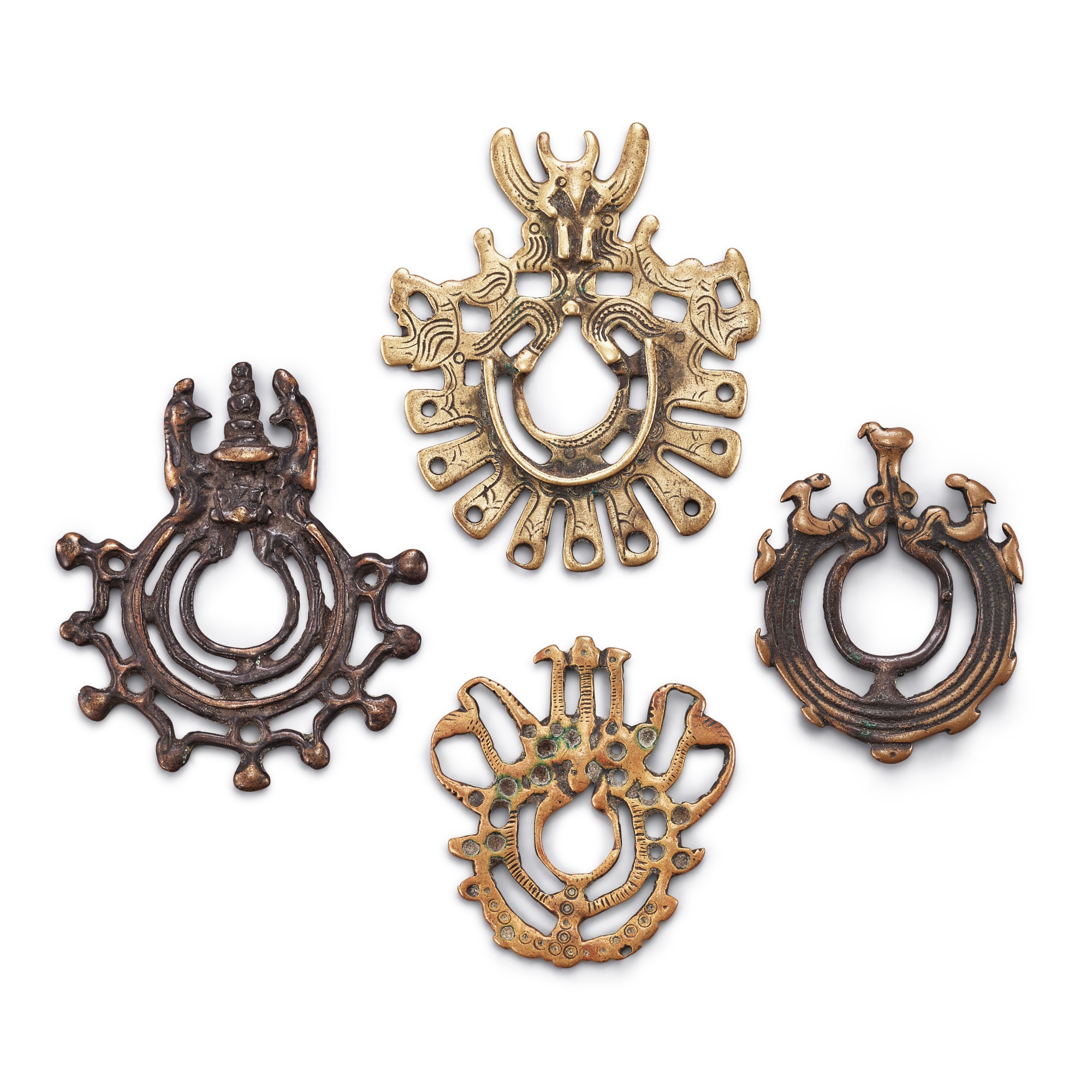 A group of 4 copper-alloy 'birds and concentric circles' thogchags, — A group of 4 copper-alloy 'birds and concentric circles' thogchags, Tibet, 8th - 11th century 八至十一世紀 西藏 鳥紋天鐵一組四件