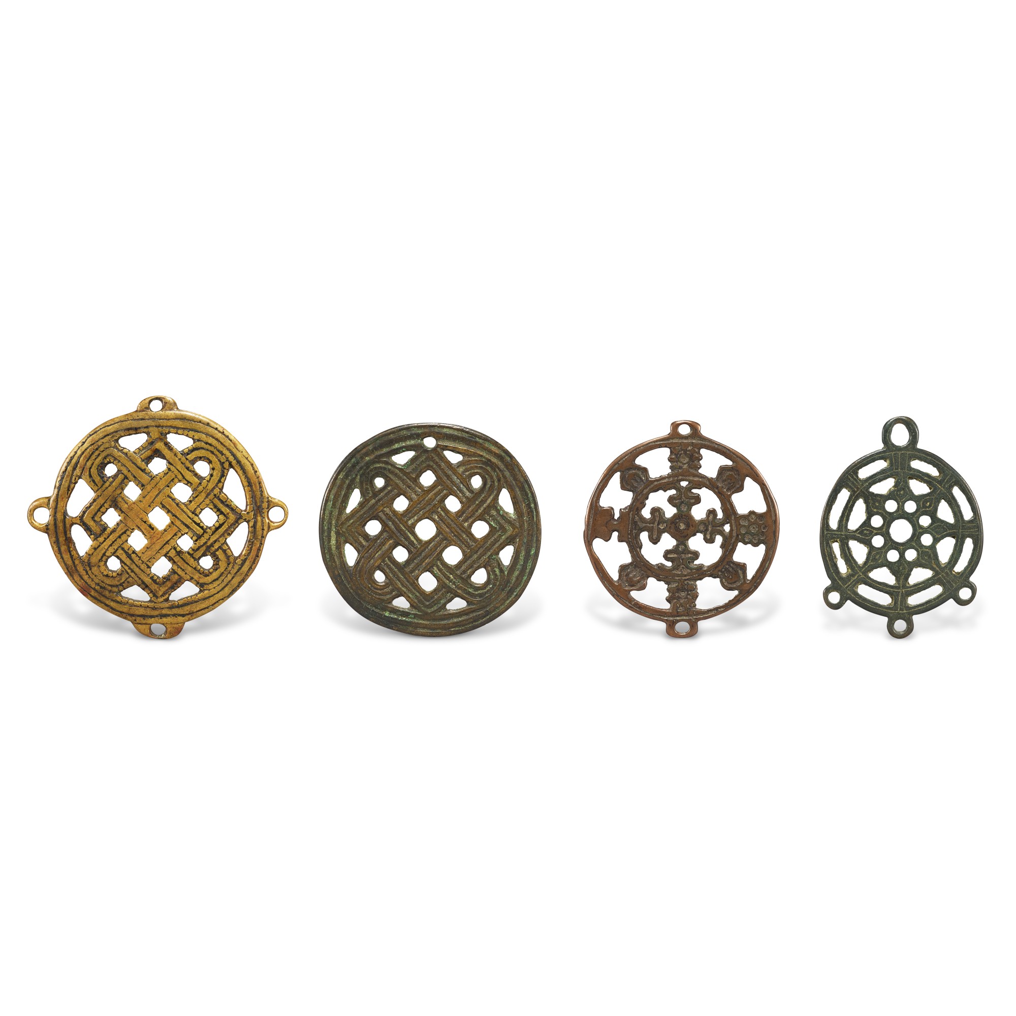 A group of 4 copper-alloy 'Buddhist emblem' thogchags, — A group of 4 copper-alloy 'Buddhist emblem' thogchags, Tibet, 12th - 15th century 十二至十五世紀 西藏 佛教紋飾天鐵一組四件