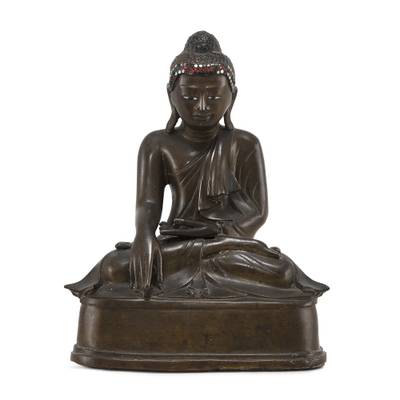 An embellished copper-alloy figure of Buddha,