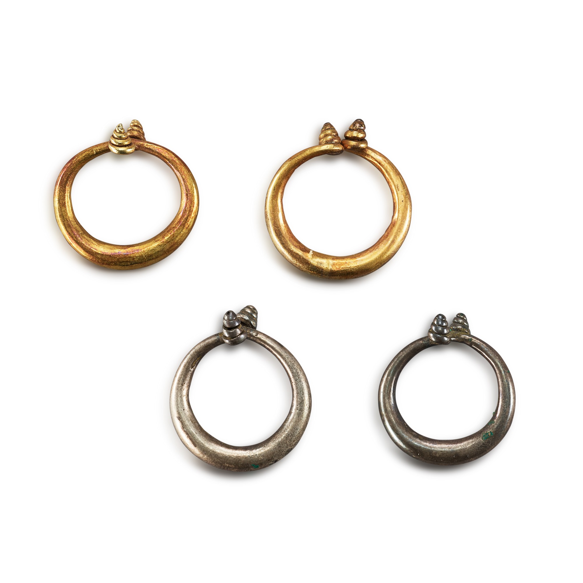 Two pairs of metal earrings,