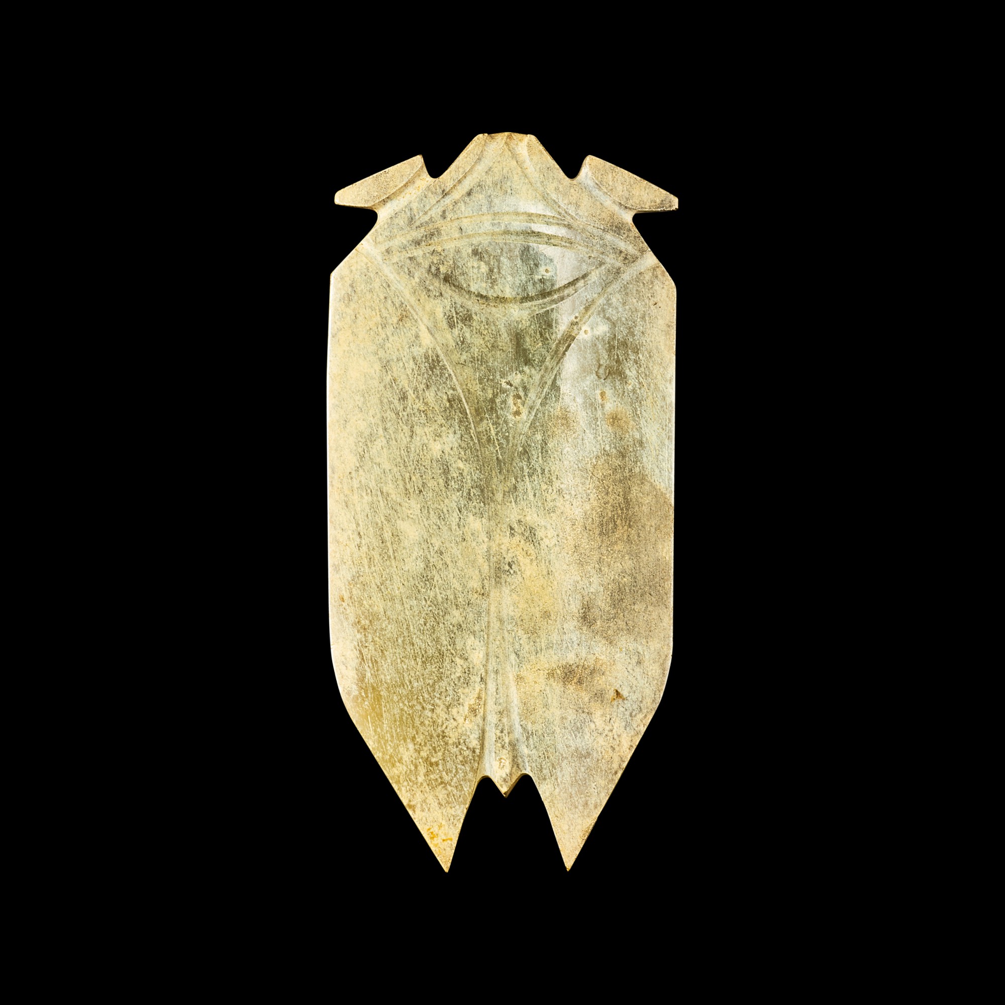 A calcified jade figure of a cicada — 漢 玉蟬