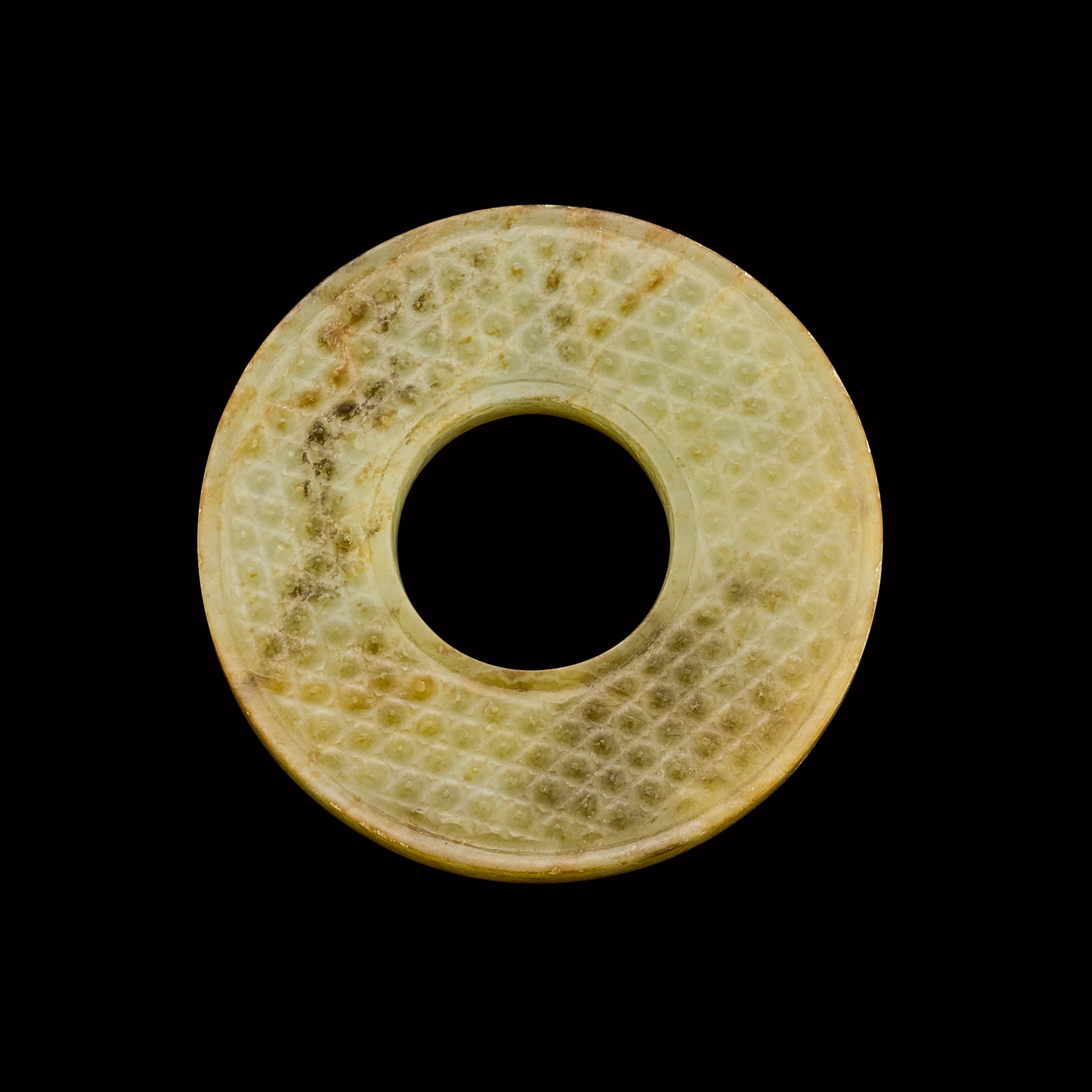 A yellow jade bi disc — 宋至明 黃玉蒲紋環