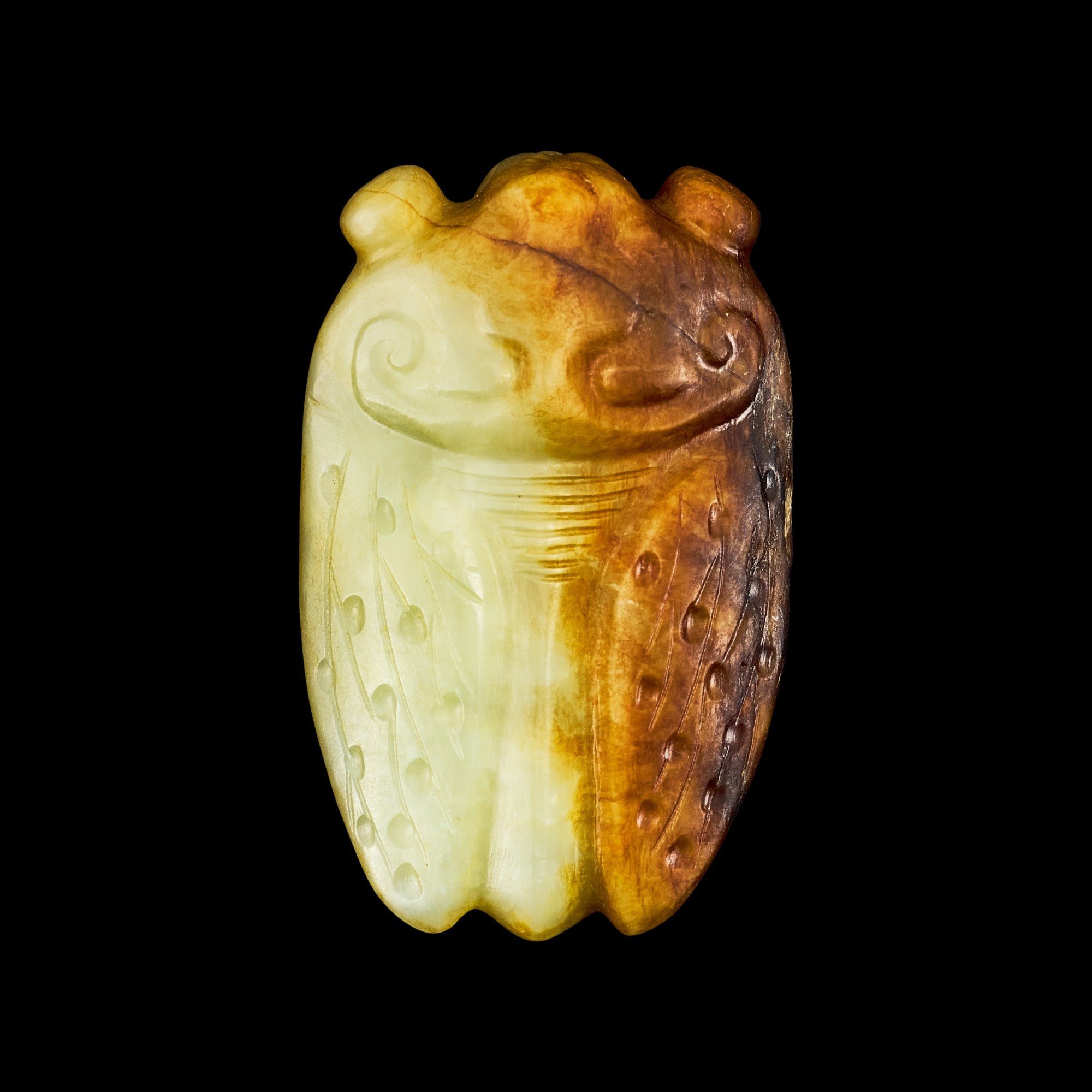 A celadon and russet jade figure of a cicada — 明末 玉蟬
