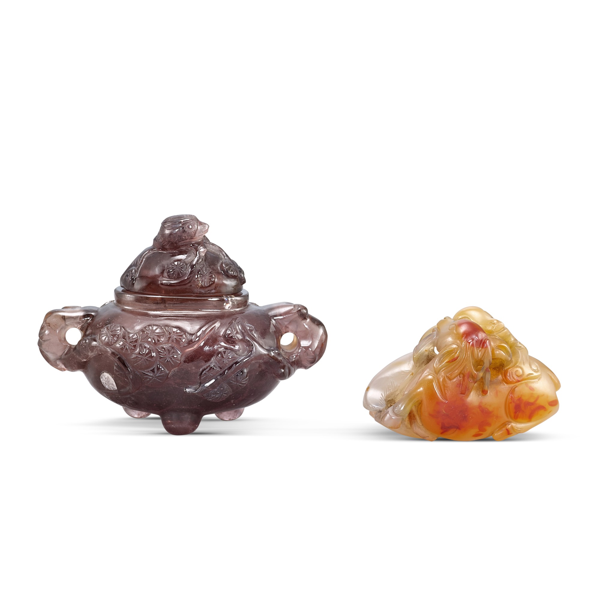 An agate 'deer and lingzhi' group and a small smoky quartz 'bird and pine' censer and cover, — An agate 'deer and lingzhi' group and a small smoky quartz 'bird and pine' censer and cover, Qing dynasty, 18th - 19th century 清十八至十九世紀 瑪瑙銜芝雙鹿 及 煙晶蒼松瑞鳥紋蓋爐