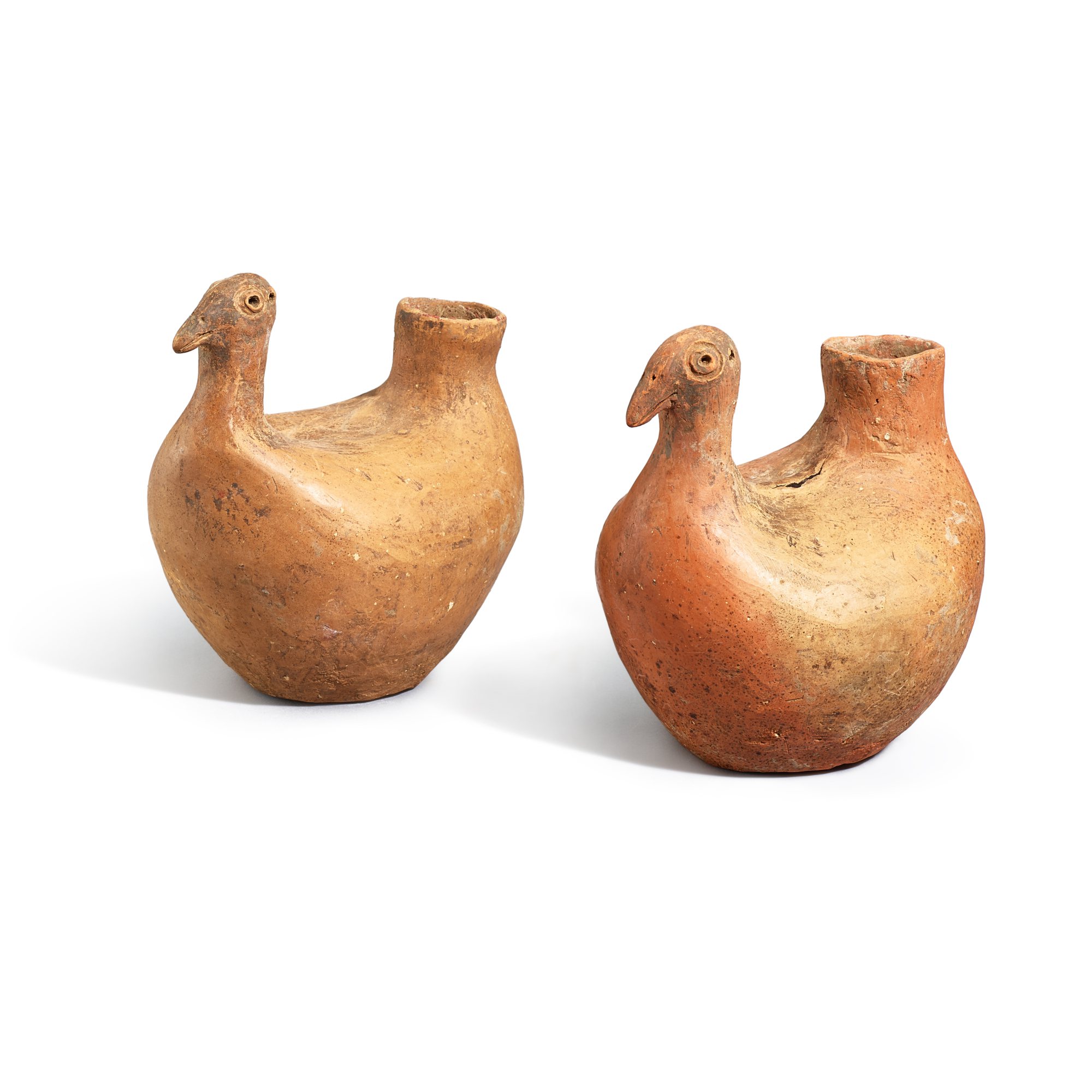 A superb pair of red pottery bird-form vessels — A superb pair of red pottery bird-form vessels Qijia culture, c. 2050-1700 B.C. 齊家文化 紅陶鳥形壺一對