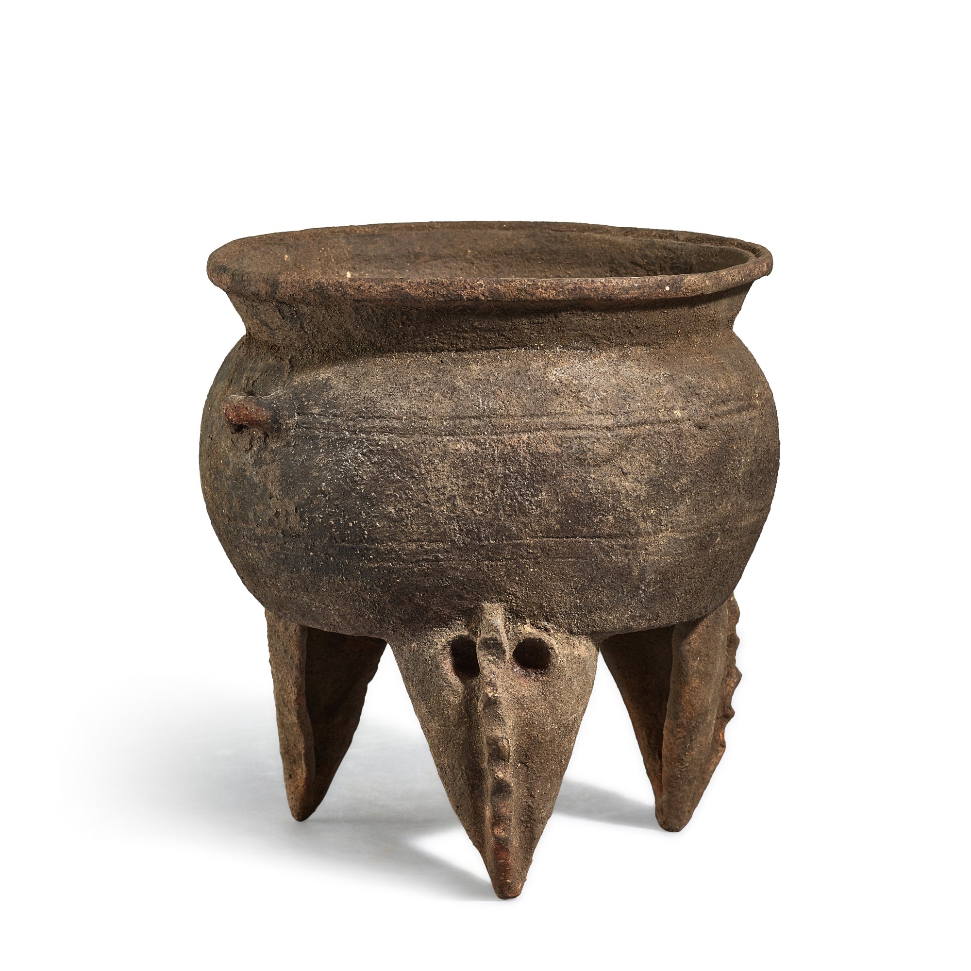 A black pottery tripod vessel, Ding, — A black pottery tripod vessel, Ding, Neolithic period, Dawenkou culture, c. 4,300-2,400 B.C. 新石器時代  大汶口文化   黑陶三足爐