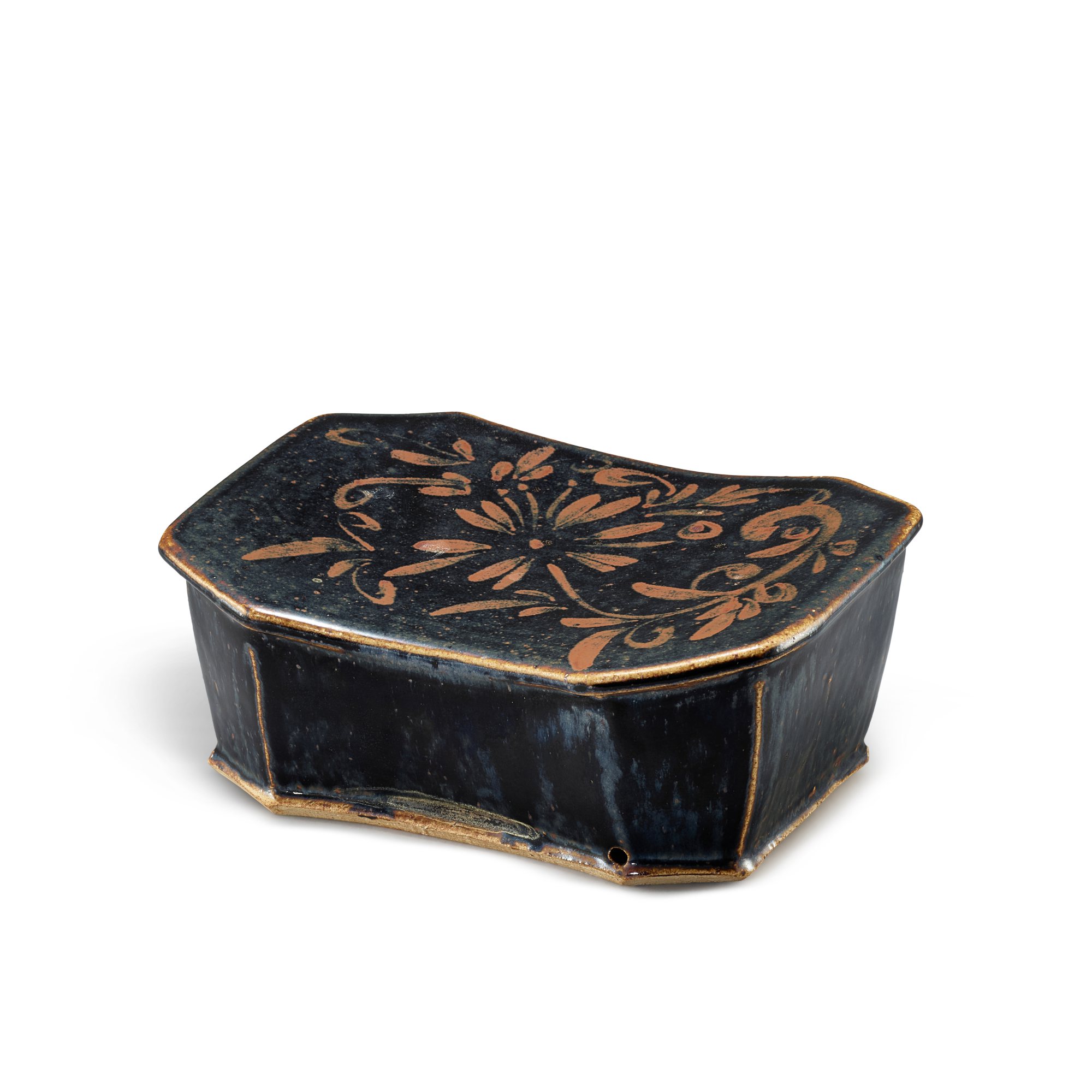 A russet-painted black-glazed octagonal pillow, — A russet-painted black-glazed octagonal pillow, Jin dynasty 金 黑釉鐵鏽花八方枕