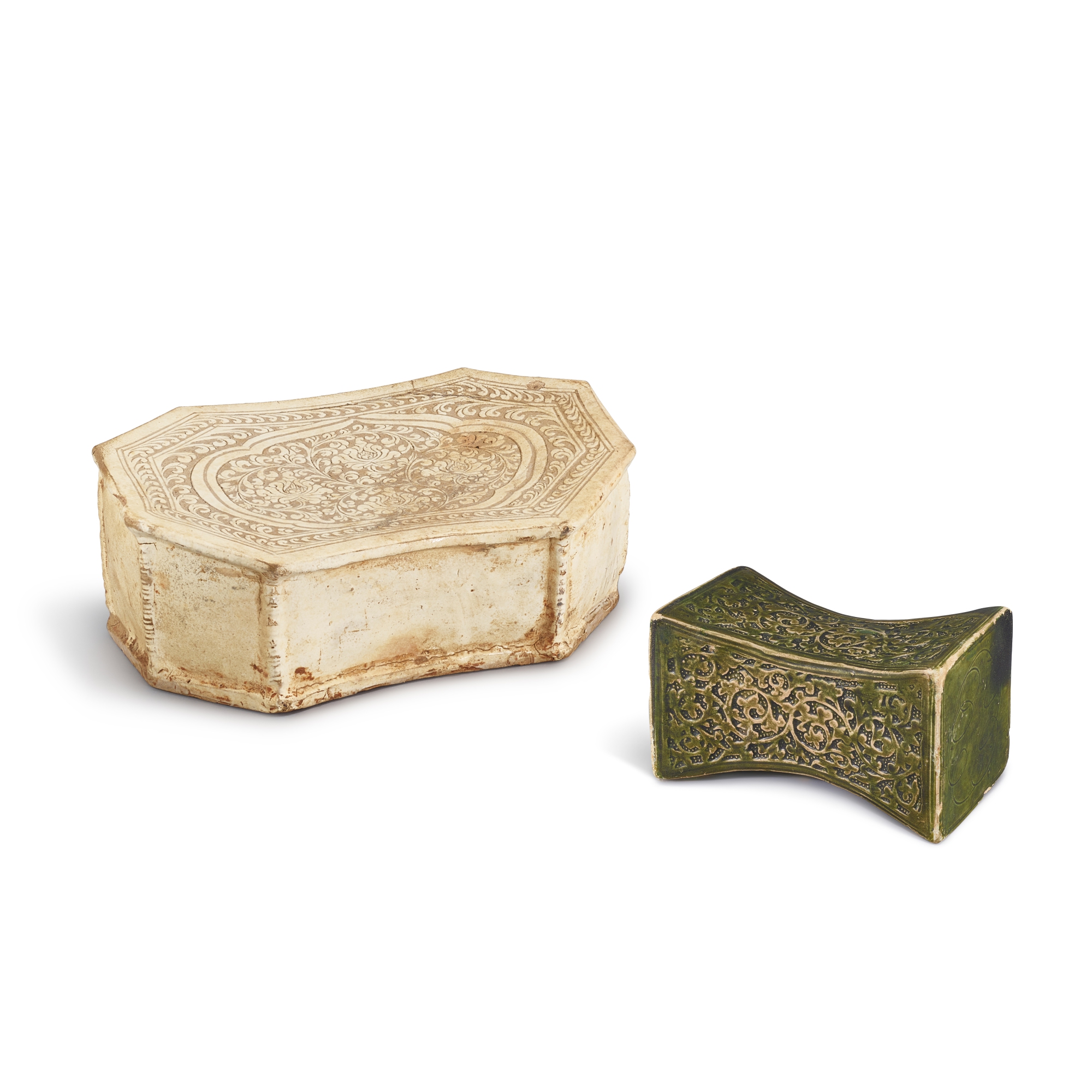 Unknown — A Cizhou sgraffiato 'peony and bamboo' octagonal pillow and a Henan moulded green-glazed pillow, Northern Song dynasty 北宋 磁州窰白地剔牡丹紋竹節棱八方枕 及 河南綠釉珍珠地印卷草紋亞腰枕