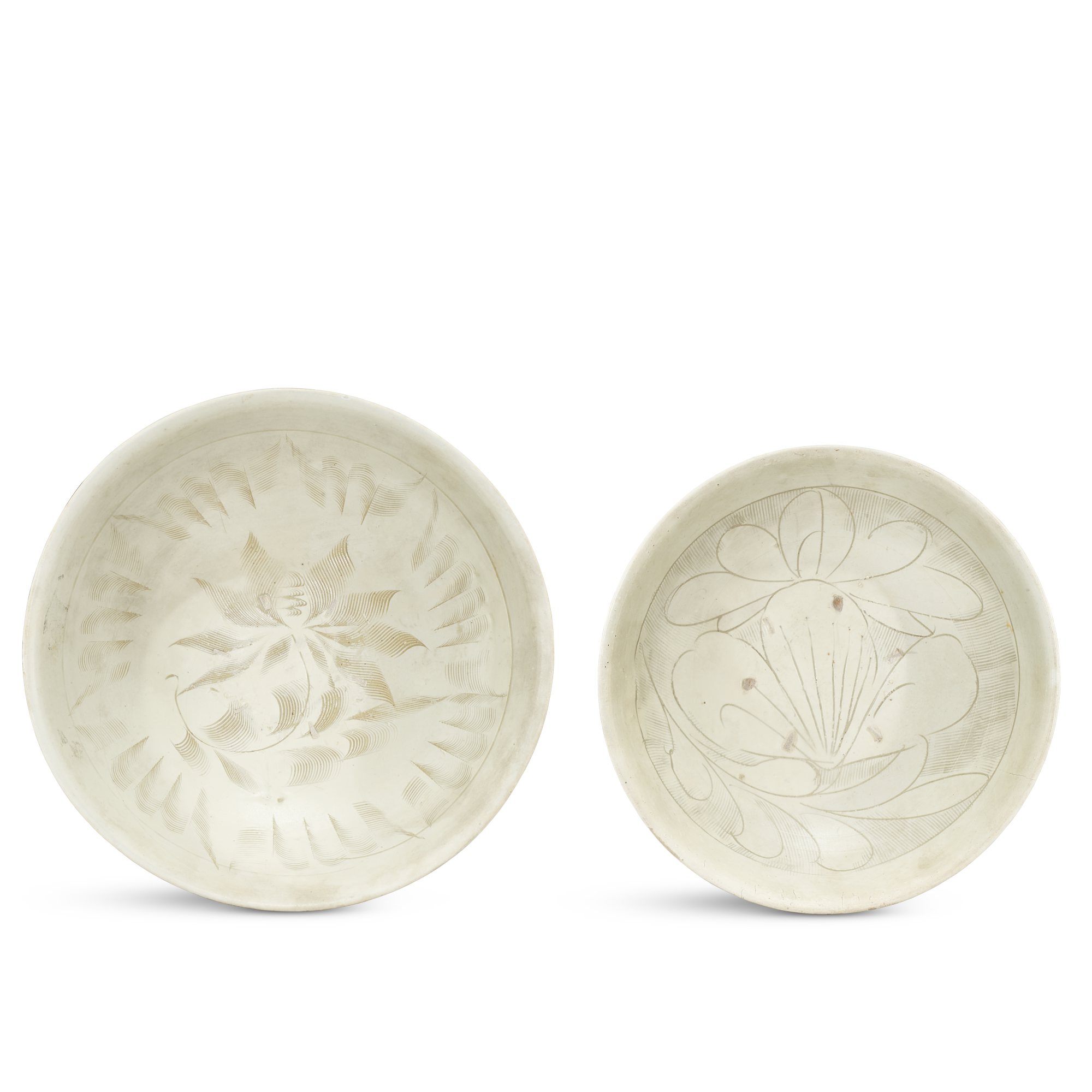 Two large Cizhou carved 'floral' bowls,