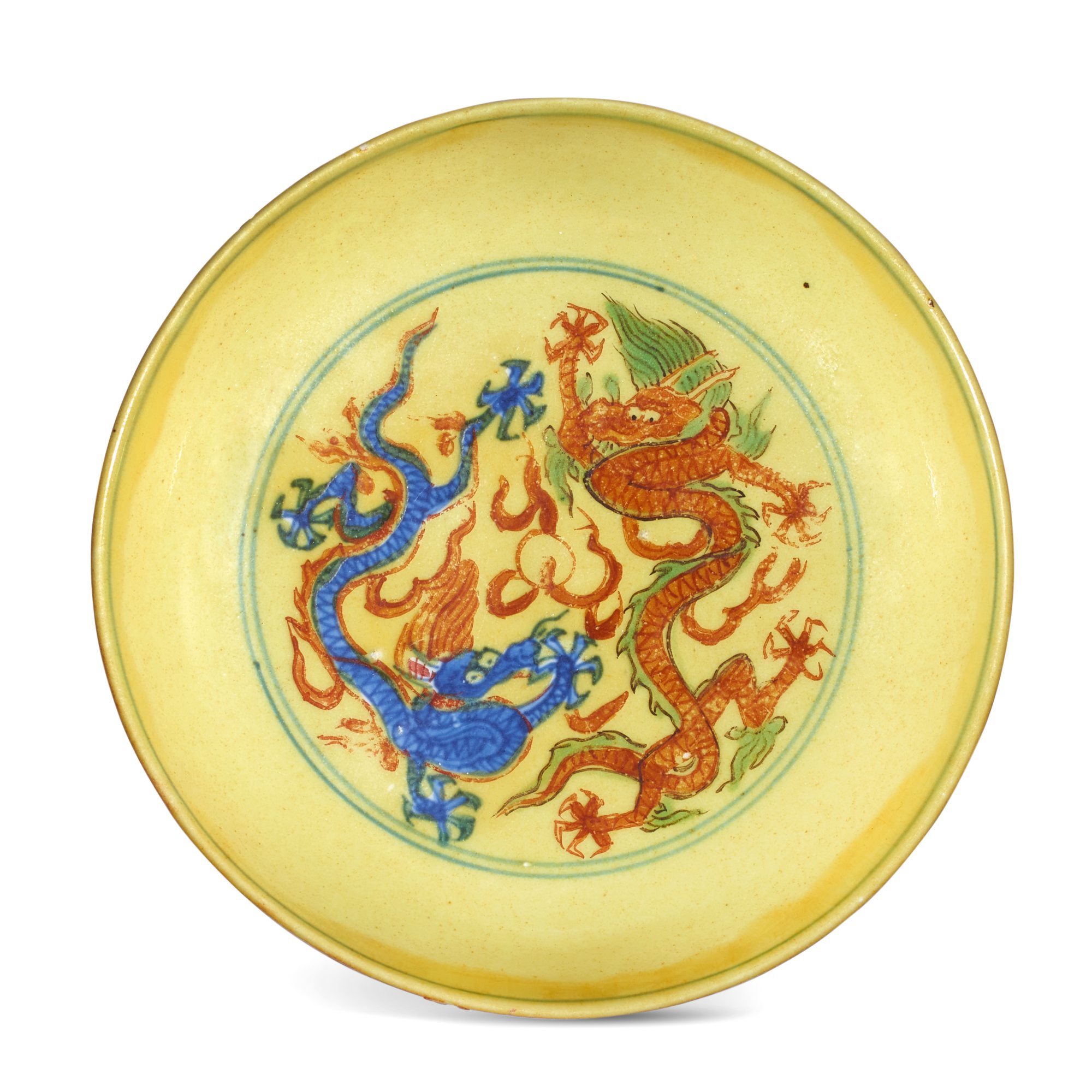 A yellow-ground wucai 'dragon and crane' dish, — A yellow-ground wucai 'dragon and crane' dish, Mark and period of Wanli 明萬曆 黃地五彩雙龍雲鶴紋盤 《大明萬曆年製》款