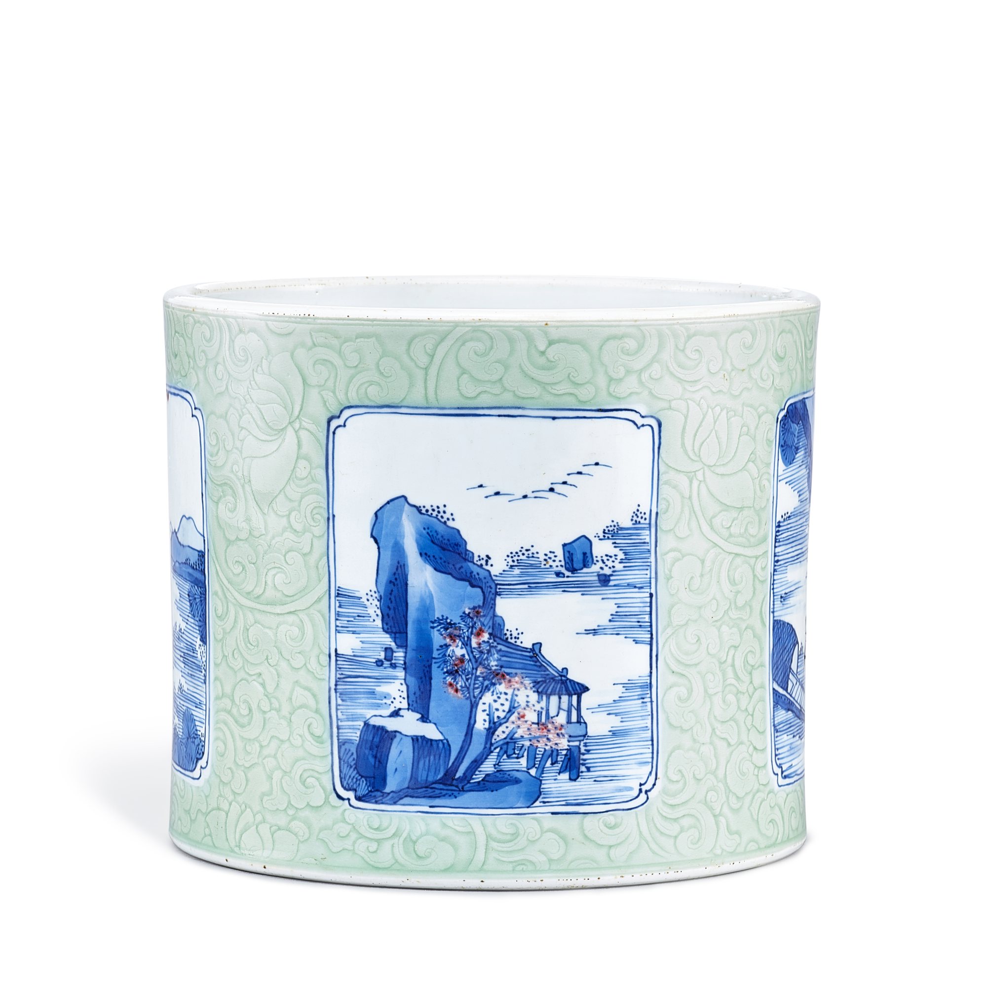 A celadon-ground underglaze-blue and copper-red 'fisherman' brushpot, — A celadon-ground underglaze-blue and copper-red 'fisherman' brushpot, Qing dynasty, Kangxi period 清康熙 豆青地青花釉裏紅開光漁樂圖筆筒