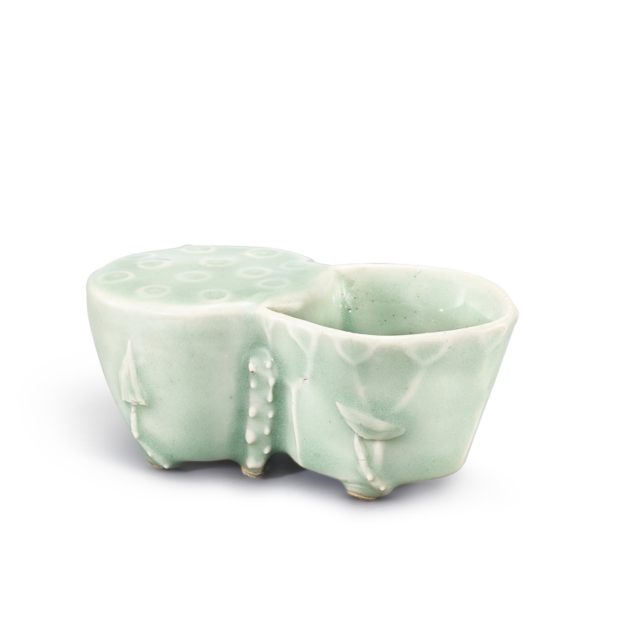 A celadon-glazed 'lotus pod' brush washer, — A celadon-glazed 'lotus pod' brush washer, Qing dynasty 清 豆青釉並蒂蓮水盂