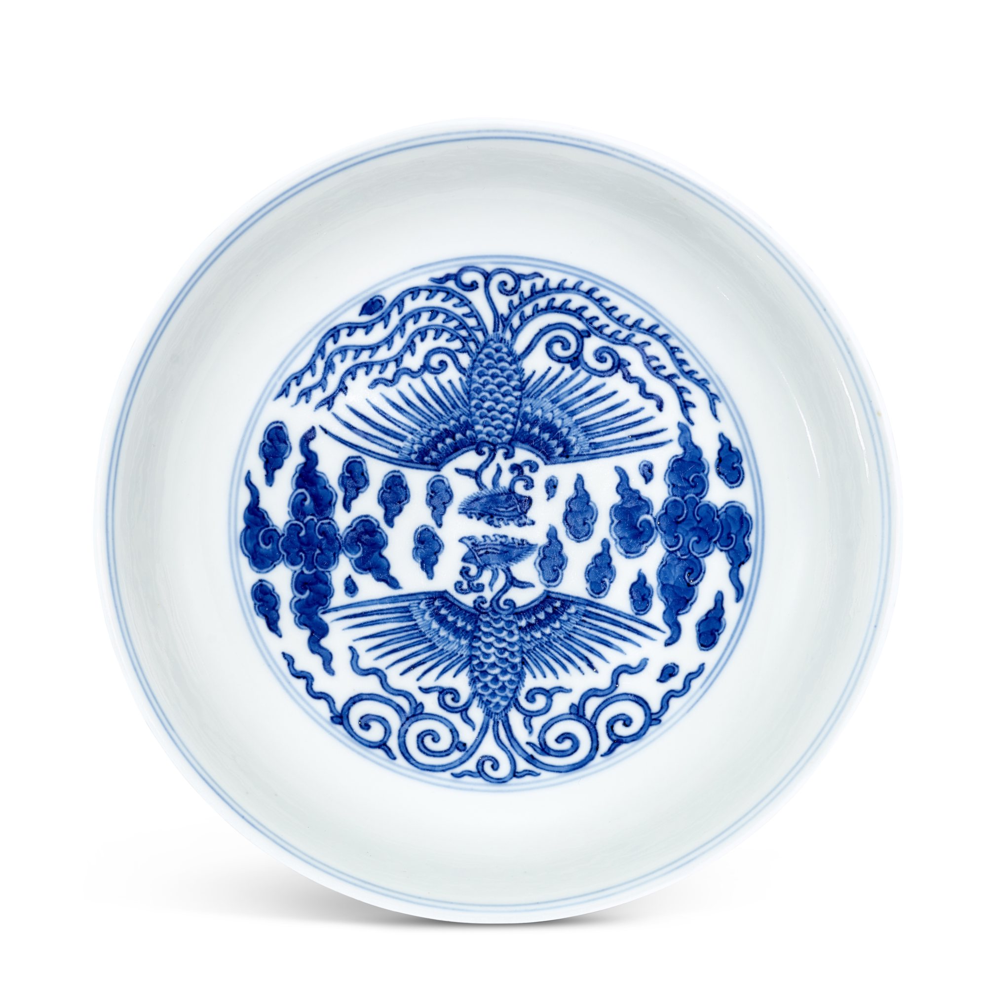A blue and white 'phoenix' dish, — A blue and white 'phoenix' dish, Seal mark and period of Qianlong 清乾隆 青花雙鳳雲紋盤 《大清乾隆年製》款