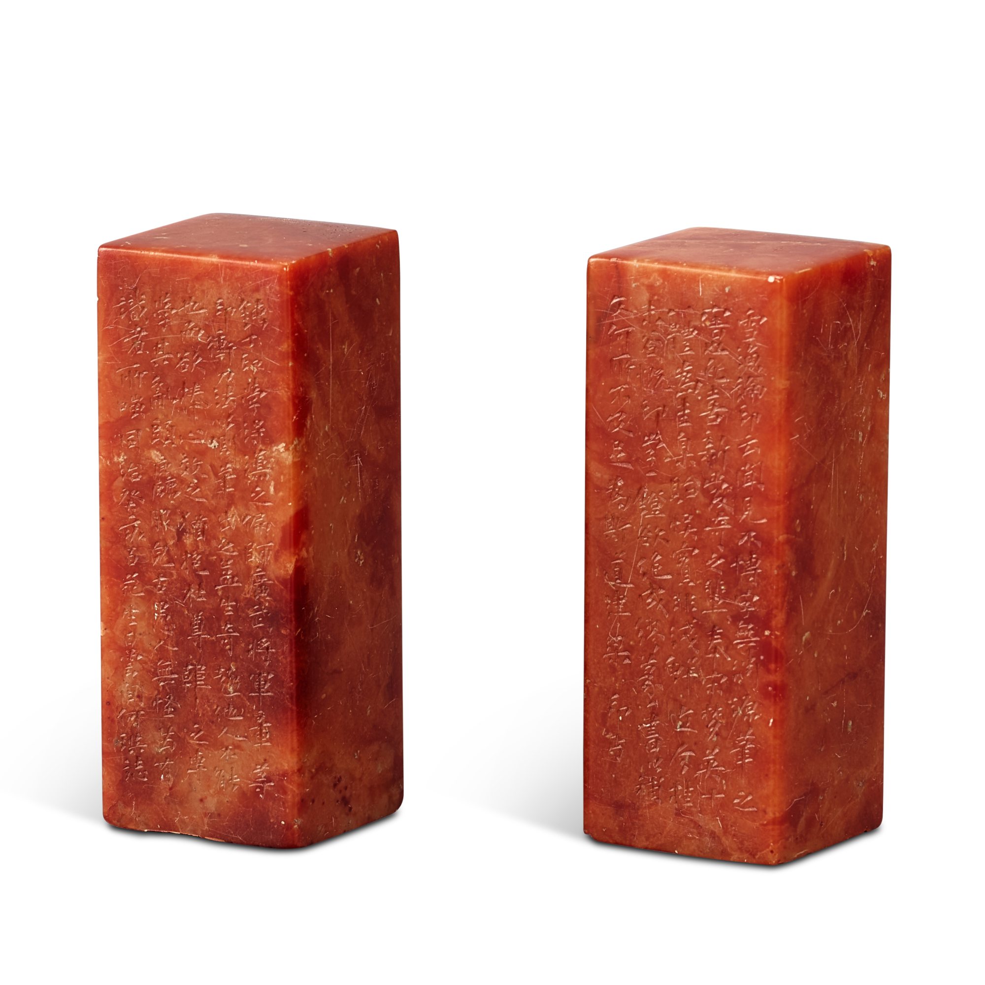 A pair of inscribed soapstone seals, — A pair of inscribed soapstone seals, Qing dynasty, Tongzhi period, dated guihai year, corresponding to 1863 清同治癸亥年（1863年） 壽山石題字方章一對 印文：「防意齋主人」、「伍泥撰之章」