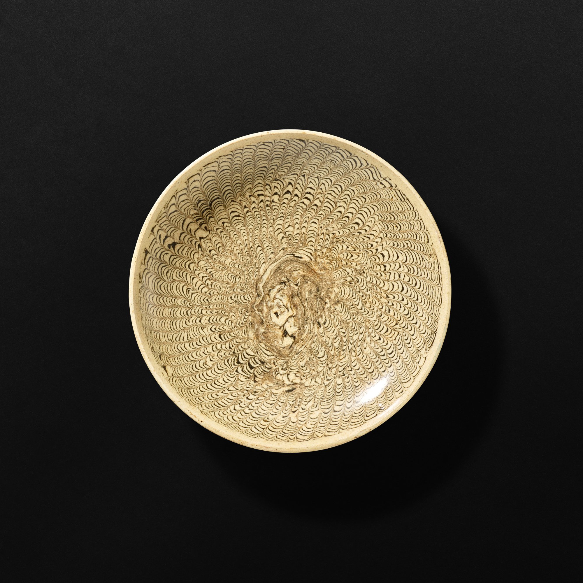 A Cizhou marbled clay dish, — A Cizhou marbled clay dish, Northern Song dynasty 北宋 磁州白釉絞胎盤