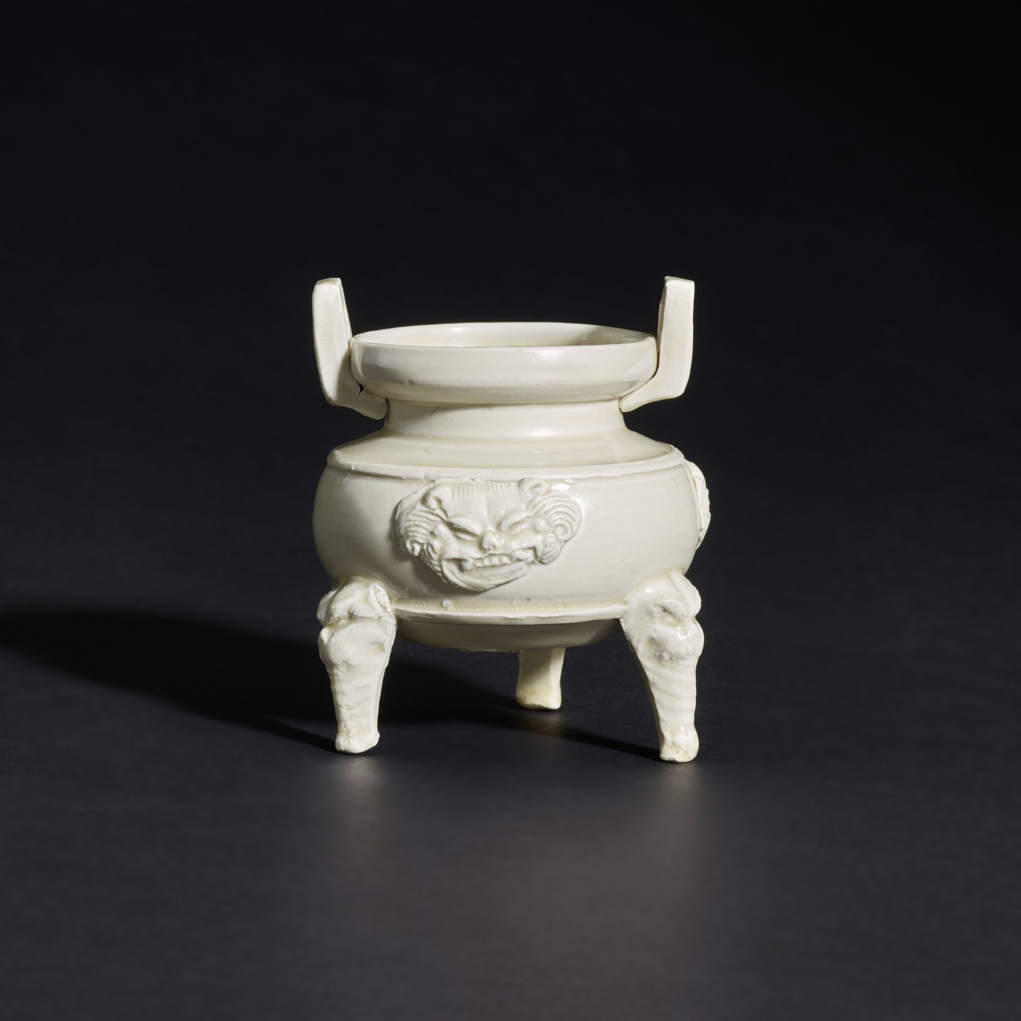 A white-glazed tripod censer, — A white-glazed tripod censer, Jin - Yuan dynasty 金至元 白釉三足爐