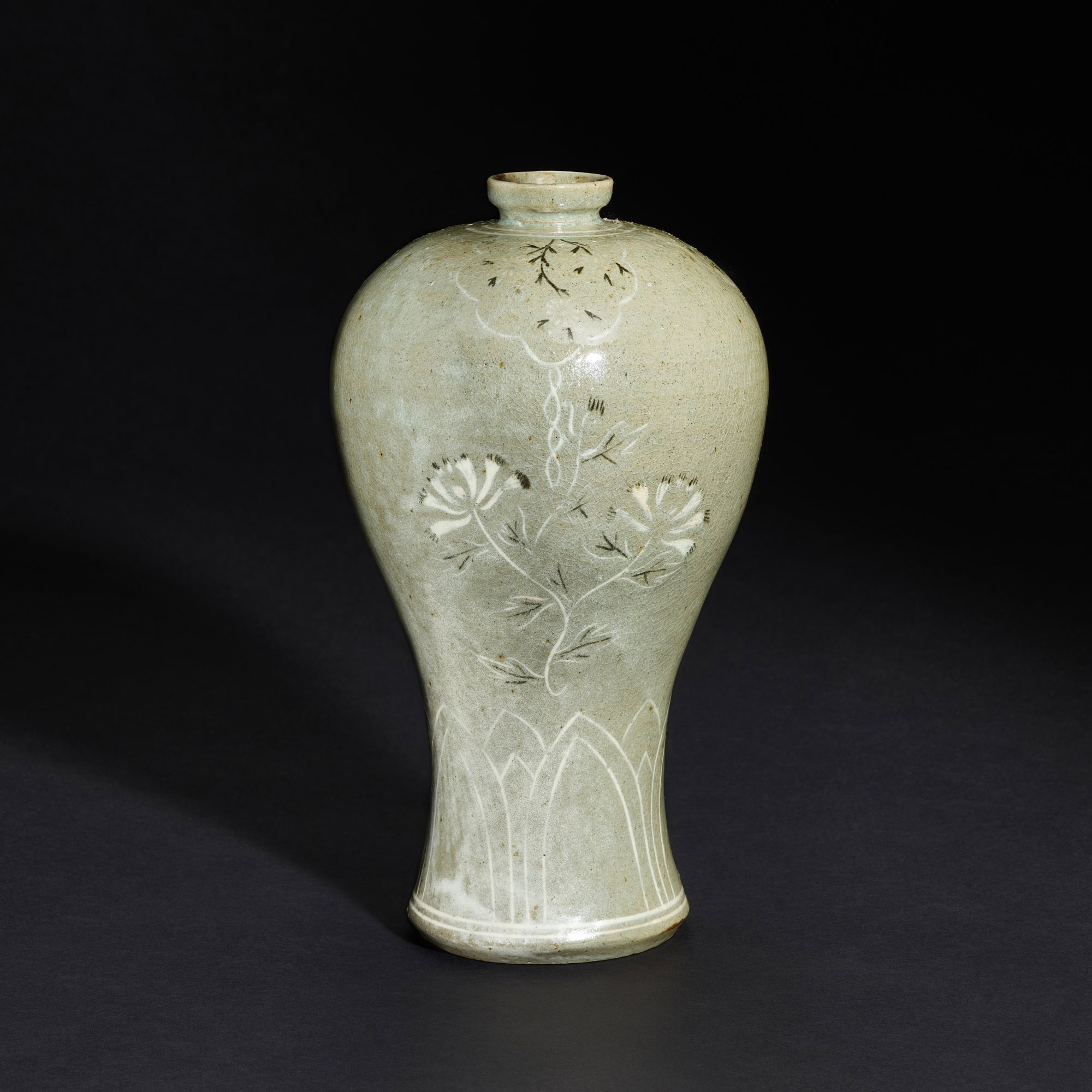 A Korean slip-decorated celadon meiping, Joseon dynasty — A Korean slip-decorated celadon meiping, Joseon dynasty 朝鮮王朝 青瓷象嵌花卉紋梅瓶